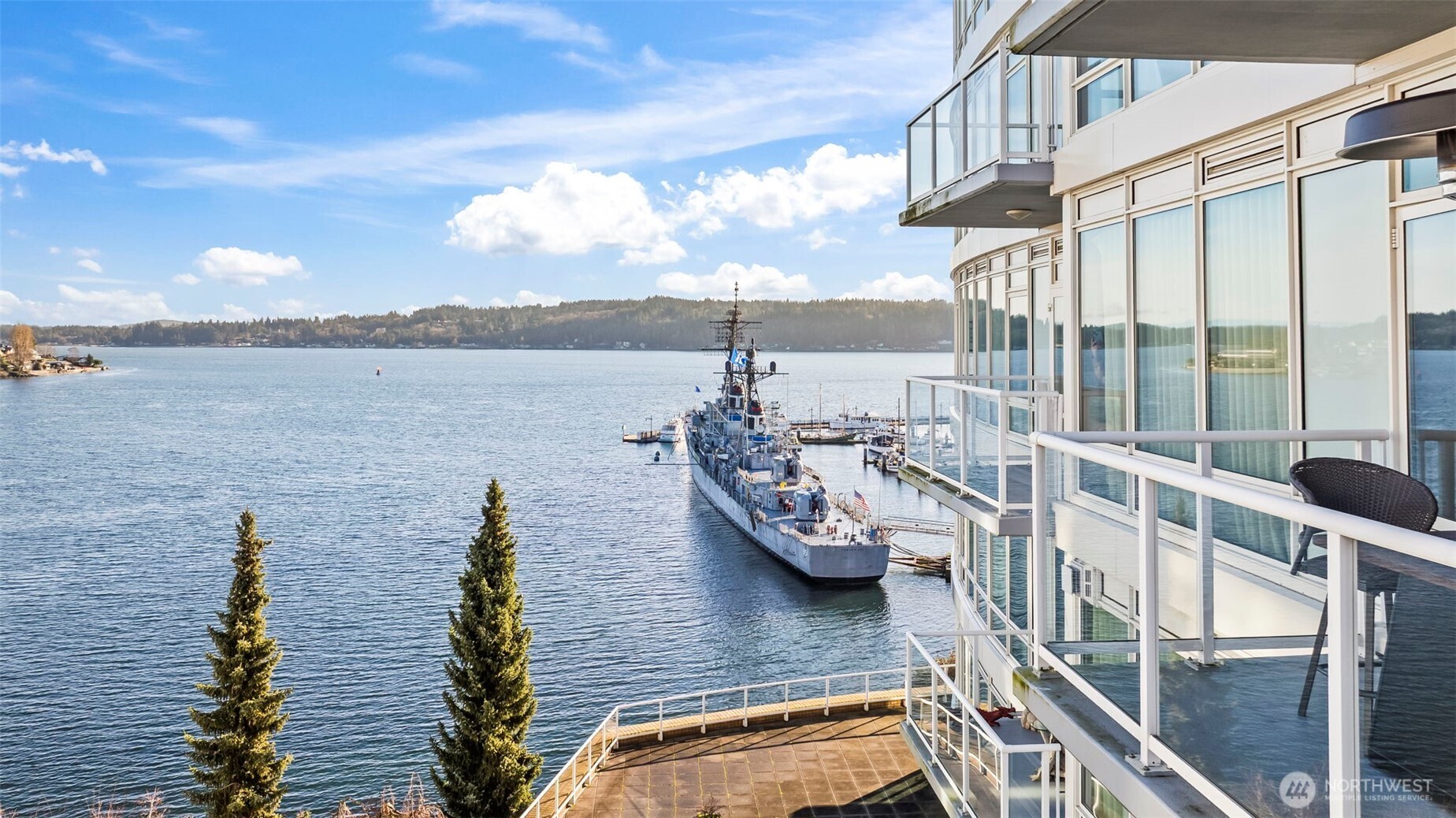 Check out this beautiful Waterfront Condo at the sought after Harborside Complex at 320 Washington. Views of Sinclair Inlet, the city lights, and the marina from your living room & private balcony. Watch the ferries and wild life and if you have a boat, check out the 300+ slip marina. Kitchen featuring solid surface counters, gas stove, marble backsplash & stainless steel appliances. Floor to ceiling windows provide a light & bright open feel to your living room. Spacious master w/walk-in closet. Bathroom w/tiled shower & double sink vanity. Enjoy living just 2 blocks from the ferry terminal which offers a fast 30 min ferry to Seattle. Secured underground parking & storage. Courtyard available for visiting with friends. Walk to breweries, shopping & restaurants and the new updated 4th street.