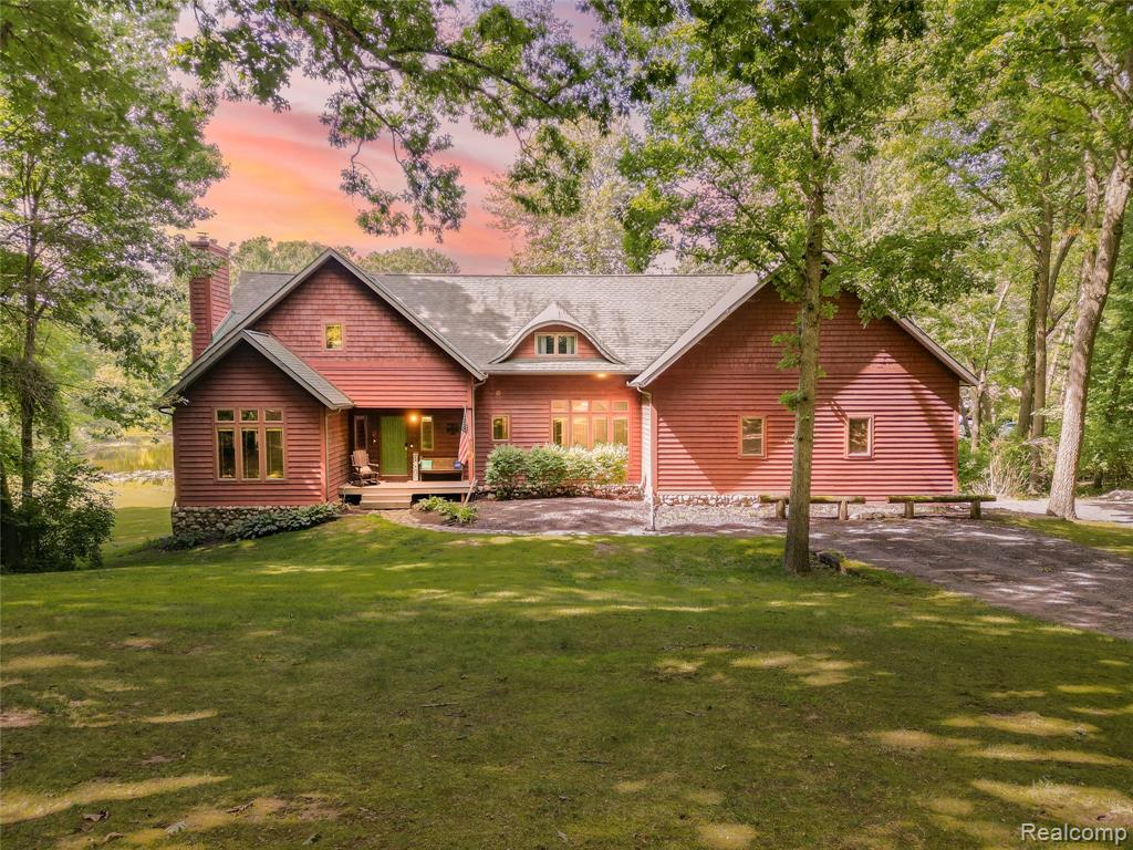 This stunning contemporary 2-story home offers an exceptional blend of luxury, comfort, and thoughtful design, featuring 4 spacious bedrooms and 4.1 beautifully updated baths. Inside, you’ll find elegant remodeled flooring, added hardwood in the living room, stylish new appliances, upgraded blinds, and plush new carpet throughout the upper level. A whole-home water filtration system, along with two inviting gas fireplaces—one in the living room and one in the finished basement—enhance the home’s warm and welcoming atmosphere. The high-ceiling 3-car garage boasts brand-new doors and openers, while the main floor provides a dedicated home office and a full bath for convenience and flexibility. The finished walkout basement offers additional living and entertainment space, complete with a included pool table, access to a cozy backyard bonfire pit, and updated gas piping supporting the heating system. Peace of mind comes with substantial mechanical upgrades, including a newer furnace (2020–2021), replaced AC compressor (2017), water heater (2016), two sump pumps, septic maintenance completed in 2024, original water softeners tested in 2020 with great results, and a nearly new washer and dryer. The property even features two driveways for exceptional convenience. Additional updates encompass drywall, plumbing improvements, and two Generac units—one servicing the upper level and one for the main home—each under warranty. Located within a desirable community, the HOA allows homeowners to enjoy boating on the private lake (boats may not be stored there). Completing this impressive property is an outdoor oasis featuring a fenced yard, a premium 2023 Trex deck with a twenty-year warranty, a luxurious 12'x9' Swim Spa, and a relaxing Hit Sauna installed in 2023—perfect for year-round enjoyment and effortless entertaining.