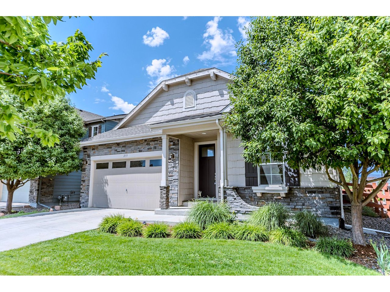 Welcome to this exceptional 5-bedroom, 3-bathroom ranch home in the Mosaic neighborhood of Fort Collins. Positioned on a premium lot backing to 20 acres of open space, this home offers the ideal combination of privacy, scenic views, and modern luxury. Step inside to discover an open-concept floor plan featuring tall ceilings, customized windows that flood the home with natural light, and thoughtfully designed living spaces perfect for both everyday living and entertaining. The kitchen boasts quartz countertops, upgraded cabinetry, a double oven, and an expansive island that makes hosting family and friends effortless. The spacious primary suite is complete with a luxurious four-piece bathroom and an large walk-in closet. Two additional bedrooms and well-appointed living spaces on the main level provide comfort and flexibility. Downstairs, the impressive basement features elevated 9-foot ceilings and a wide-open layout, creating endless possibilities for a recreation room, home theater, fitness area, or additional living space. Two more bedrooms and a full bathroom make this level ideal for guests or multi-generational living. Outside, enjoy the newly planted garden and vibrant flower beds, creating a peaceful outdoor oasis while taking full advantage of the breathtaking open space directly behind the home. As a resident of the Mosaic community, you'll also enjoy access to two neighborhood swimming pools, parks, trails, and a welcoming community atmosphere. This is a rare opportunity to own a premium ranch home with exceptional indoor and outdoor living in one of Fort Collins' most desirable neighborhoods.