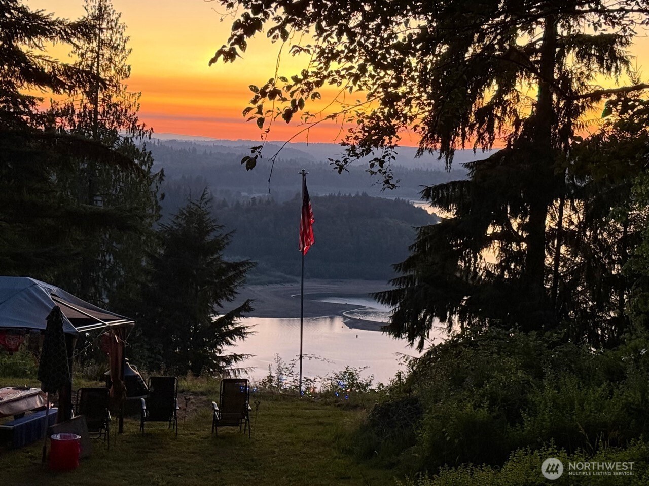 Great 5+ acre parcel in the gated community of Alta Vista. Has some nice rolling topography, a killer secluded building site with a westerly view of the Mossyrock Dam. Great little pond that is about 6' deep nestled into the woods that at one time was stocked with fish. It has an insulated 24' by 30' garage / cabin that can be used for those "camp out" weekends or what ever while your dream home is being built. Tons of potential, water, septic and power all in place ready to go.