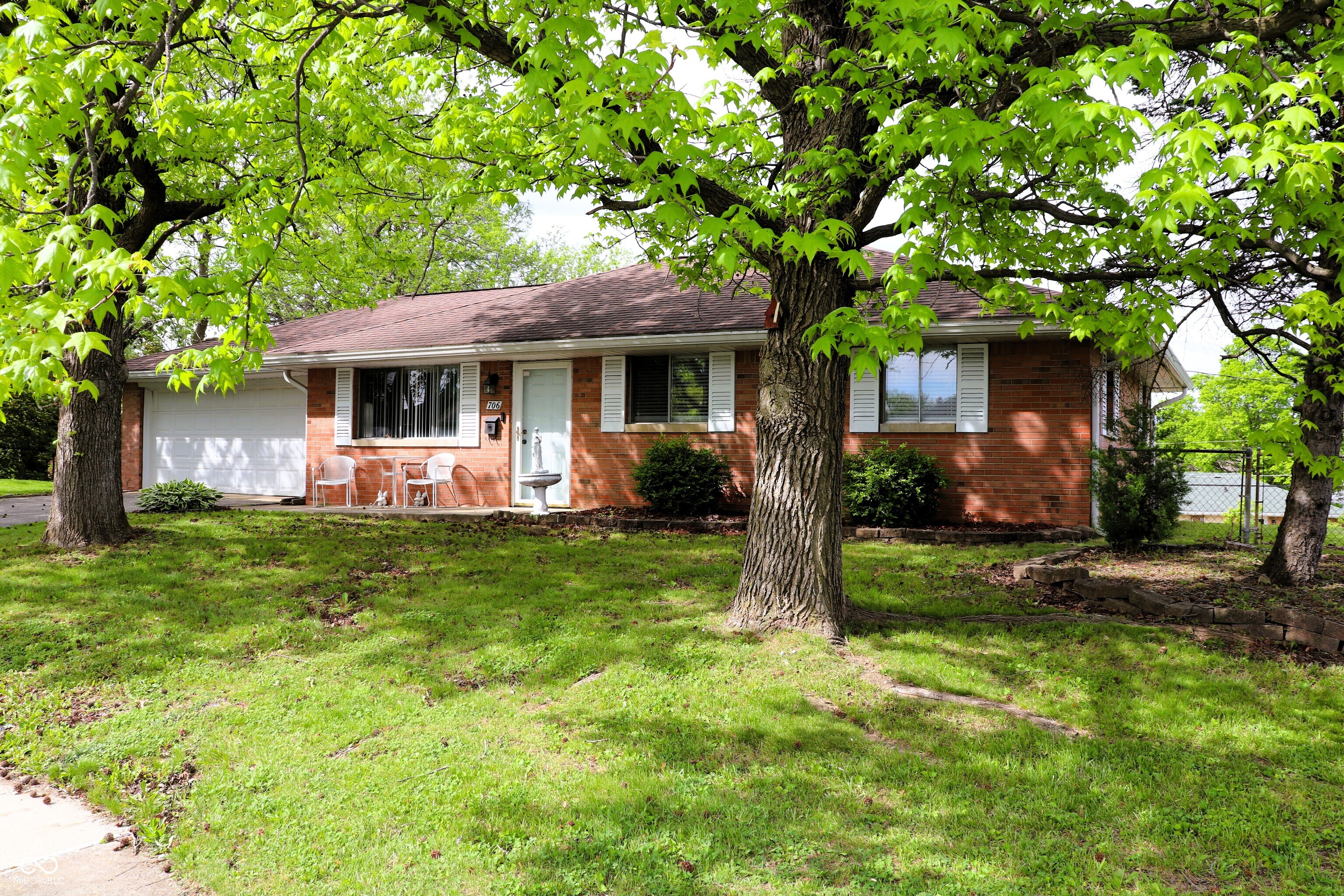 Welcome home to this beautifully updated 3-bedroom, 1-bath brick ranch located in the heart of Beech Grove! Perfectly blending classic charm with modern updates, this move-in-ready home offers comfort, style, and functionality. Step inside to find brand new flooring, fresh trim and molding, and stylish new interior doors throughout. The spacious living areas are complemented by new ceiling fans and abundant natural light. The remodeled bathroom boasts sleek finishes, offering a fresh, contemporary feel. The kitchen and living space flow seamlessly into a large, fully fenced backyard, perfect for pets, play, and outdoor entertaining. Enjoy summer BBQs on the oversized concrete patio with plenty of room for seating, dining, and gatherings. Major upgrades provide peace of mind for years to come, including new 200 amp electrical service, AC/Heat Pump, and several other thoughtful improvements. Situated on a cul-de-sac in the neighborhood with easy access to schools, parks, and all that Beech Grove has to offer, this home is ideal for anyone looking for a turnkey property. Don't miss your chance to own this gem...schedule your showing today!