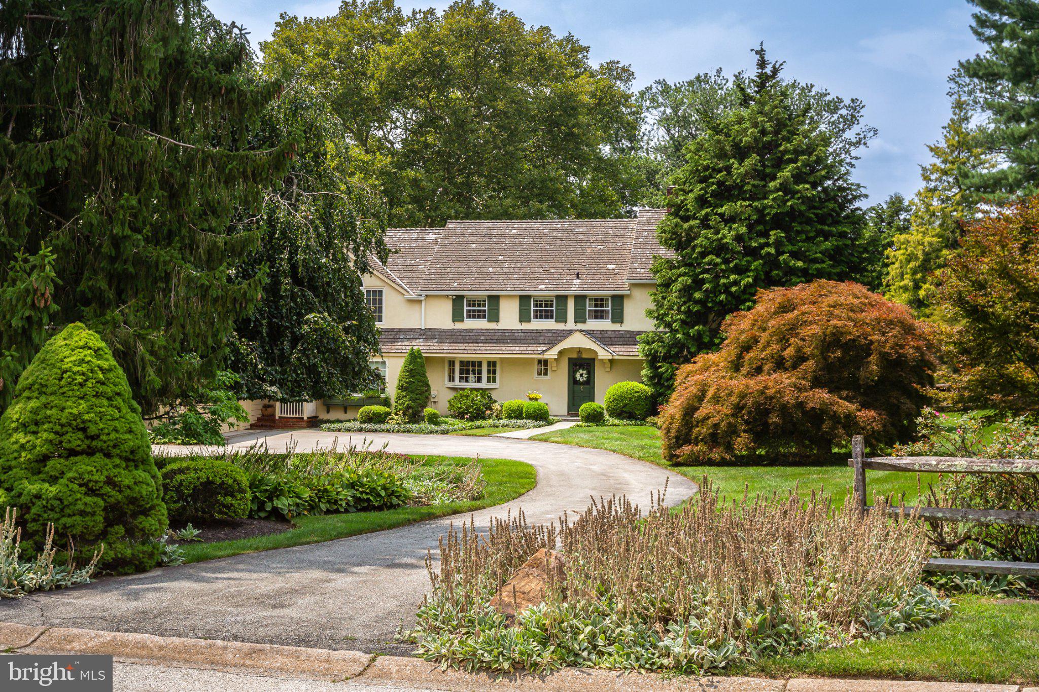 A QUINTESSENTIAL MAIN LINE HOMEAt 672 Clovelly timeless elegance meets exceptional quality craftsmanship in the heart of the Main Line. This exceptional property is tucked away on a quiet street and down a circular driveway. The eye-catching, classic home boasts classic curb appeal, traditional wood shutters, and an attached, 2-car garage, all set against an expansive and level lot with a mature, tree-lined landscape.ARCHITECTURAL DETAIL AND CHARACTEREvery inch of this home exudes warmth and charm thanks to renowned local builder Walter Off. Classic details grace the interior, including four fireplaces, hardwood floors, bay windows, crown molding, built-ins, natural light and substantial millwork throughout.MAIN LEVELLIVING ROOM AND STUDY Step inside and immediately you’ll notice the high quality craftsmanship of the home. The formal living room and study each feature their own fireplace—two of four fireplaces in the home, creating a warm and welcoming place to unwind. The kitchen features custom solid-wood cabinetry, stainless steel appliances including a double oven and dual sinks, ample counter space, and barstool seating. The convenient mudroom with a sink opens to the breezeway and garage. SUNLIT ADDITION A sun-filled addition features a charming breakfast room opening to the heart of the home: a step-down family room that seamlessly flows with the rest of the home’s interior. This space boasts a hearth-to-ceiling fireplace, large windows, and french doors to the rear patio. MAIN LEVEL SUITE A private main-level bedroom with en suite bathroom offers scenic views of the peaceful rear yard. This is the perfect home for those seeking multi-generational living, an au-pair suite, or an accessible home you can enjoy for decades! OUTDOOR LIVINGEnjoy seamless indoor-outdoor living and entertaining with a rear patio, partially shaded with a stunning pergola, ideal for relaxing or entertaining while overlooking the pristine, level landscape and SERENE POOL!ROOM FOR EVERYONEHeading upstairs, you will find a thoughtfully designed layout offering space, privacy, and comfort for all. PRIMARY SUITE A spacious, sunny sanctuary featuring a walk-in closet featuring built-ins and a private en-suite bathroom complete with a stall shower and a jetted tub. Even better: the primary enjoys its own home office with bookshelf-lined walls. ADDITIONAL BEDROOMS AND BATHS The third bedroom boasts its own en suite bathroom, while the fourth and fifth bedrooms share use of the hallway full bathroom. Downstairs, an unfinished basement with laundry and walkout stairs awaits customization or use as storage space. UNBEATABLE LOCATION AND ACCESSIBILITY Set along a quiet, tree-lined street, this home offers the ideal balance of peaceful neighborhood living and incredible everyday convenience. PRIME MAIN LINE PROXIMITY Enjoy fast access to the towns of Newtown Square and Devon, premier shopping and dining in nearby Wayne, and seamless commuting via Regional Rail and Amtrak service via Devon and Paoli stations. PARKS AND RECREATION Here you’ll be just moments from outdoor green spaces like James Dittmar Park and The Willows, as well as Aronimink Golf Club. TOP-TIER COMMUNITY ASSETS Located within the highly regarded Tredyffrin-Easttown School District and proximal to the respected Easttown Township library system, parks and, of course, the DEVON HORSE SHOW!