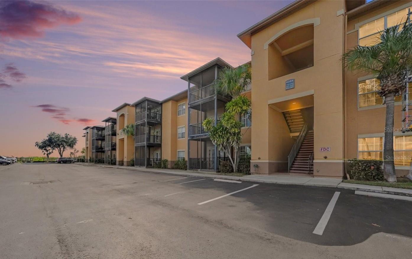 Welcome to resort-style living in Tampa’s highly desirable gated Beachwalk community! This tastefully updated 2-bedroom, 2-bathroom condo seamlessly combines modern luxury, everyday convenience, and coastal charm. Freshly painted throughout with clean, contemporary modern touches.Upgraded Flooring: Gorgeous luxury vinyl plank (LVP) spans the main living areas and bathrooms.The kitchen is outfitted with all-new appliances and ready for easy meal prep and entertaining. Beautiful new barn style door tucks away your washer and dryer.The primary en suite bathroom features a new vanity with 2 sinks, smart toilet, and smart mirror. Unbeatable Amenities & Outdoor Living! Private deeded 1-Car Garage: Rare and incredibly valuable extra storage and secure vehicle parking! Spectacular Sunset Views: Unwind on your private balcony while enjoying beautiful partial views of Tampa Bay and taking in Florida’s world-famous sunsets. Waterfront Lifestyle: Stroll down Beachwalk’s signature neighborhood boardwalk or head straight to the community kayak launch for direct access out into Tampa Bay. Enjoy the resort style pool and clubhouse with full gym! Whether you're looking for a peaceful waterfront sanctuary or a vibrant home with top-tier community amenities, this beautiful residence is completely move-in ready.