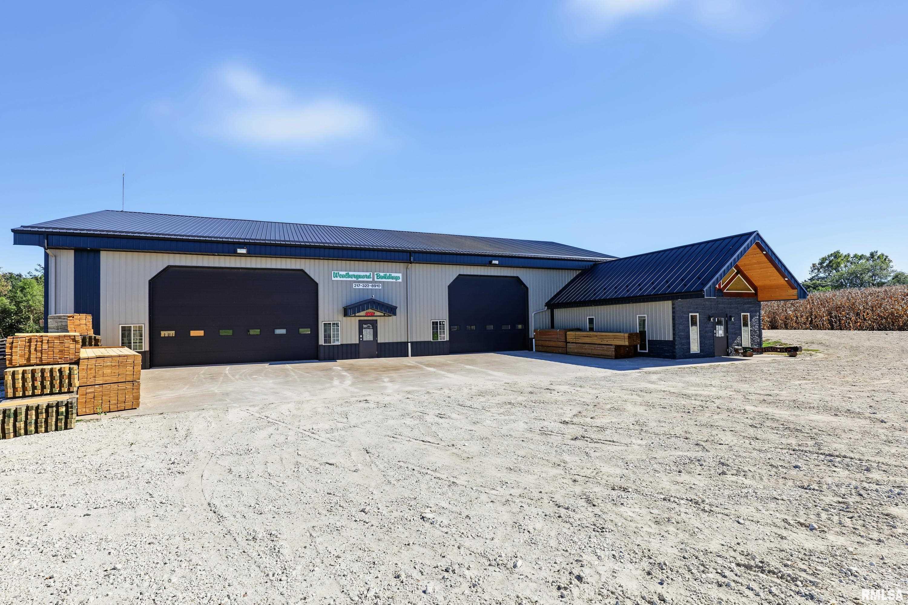 Parcel number TBD Shop with 5 Acres.  Adjacent 29 Acres also available.  Fully insulated with spray foam, heated concrete floor system, 19' sidewalls, Garage doors are 15.5' tall and 2', 19' and 12' wide.  Main building is 60x104, attached building to rear is 32x60. Office/Living Area is 22x32 with loft.  Small pond in front of the building is approximately .3 Acres.  Nearly 1.5 Acre gravel area for parking or storage.  One full bath is in the office/living space with an additional 1/2 bath in the shop area.  The uses for this building are endless.  It can be used for many business purposes and/or used as a combination living quarters and shop etc.  Pride of ownership throughout.  Seller needs to keep possession of the shop for 6 months after listing date.