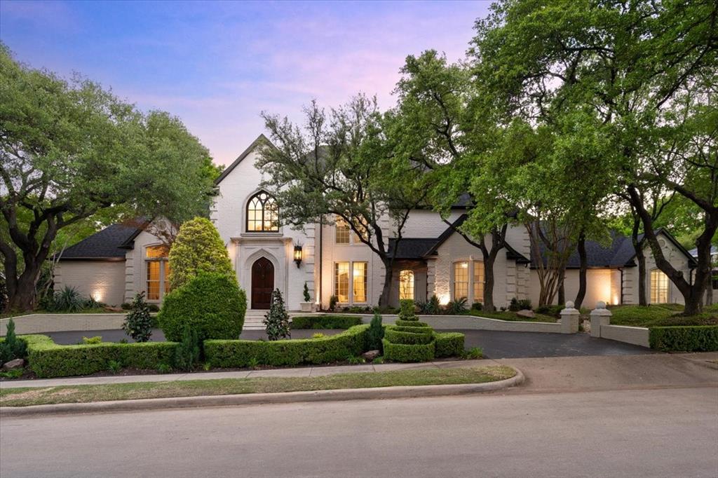 Introducing a quintessential home that embodies luxury living in the prestigious Glen Eagle Country Club of Plano. This stunning French country residence sits on an expansive corner lot in a tranquil cul-de-sac, covering 0.45 acres, & features captivating architectural design. With a circular driveway, majestic trees, & meticulously maintained landscaping, this property exudes curb appeal.Step inside to discover a breathtaking foyer highlighted by an elegant iron staircase & exquisite marble floors. The sophisticated dining room seamlessly flows into the grand living area, complete with a cozy fireplace & magnificent views of the sparkling pool. The chef's kitchen is a culinary enthusiast's dream, boasting a fantastic bar, a spacious island, a butler’s pantry, & a wet bar equipped with dual wine coolers & a beverage fridge. Lots of ample storage in the large walk-in pantry, along with high-end appliances, including a commercial gas cooktop, microwave, double ovens & a brand-new Sub-Zero refrigerator.The impressive family room features soaring ceilings, rich wood paneling & another inviting fireplace. The first floor has two spacious bedroom suites & a dedicated study. The master suite is a true retreat, offering a generous sitting area with picturesque views of the pool, as well as a luxurious bathroom complete with marble countertops, a soaking tub & his and her closets.Upstairs has three additional bedroom suites & a versatile game or media room that comes with its own wet bar & refrigerator—perfect for entertaining. The newly updated backyard oasis is a true showstopper, featuring a large, covered patio, an elegant pergola, a stunning gazebo & a spectacular pool with an accompanying spa, complemented by five serene water fountains & lush gardens. Convenient pool bath, a spacious laundry room & new epoxy flooring in the garage. Amazing neighborhood. Top-rated Plano ISD. Quick access to all major Hwys, Plano's Legacy West, Dallas Cowboys & PGA HQs