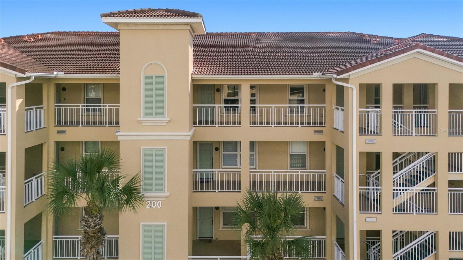 Motivated Seller!!! Experience elevated coastal living in this top-floor 2-bedroom, 2-bathroom condominium offering high ceilings, many modern updates, and peaceful views of the Intracoastal Waterway. Newly refreshed with paint, upgraded lighting and ceiling fans throughout, new appliances, a stylish kitchen backsplash, and significant upgrades to both bathrooms.  This home blends comfort with contemporary appeal.  The bright, open layout flows effortlessly to a private lanai where you can enjoy gentle breezes and tranquil water views. A beautifully updated residence in a serene waterfront setting.An amazing array of amenities makes this the perfect location, including a clubhouse, pool, spa, fitness center, pickle ball, miles of walking/jogging/biking paths, kayaking, and easy access to the beach which is less than a mile away.All units also come with a large garage for your vehicle and storage.