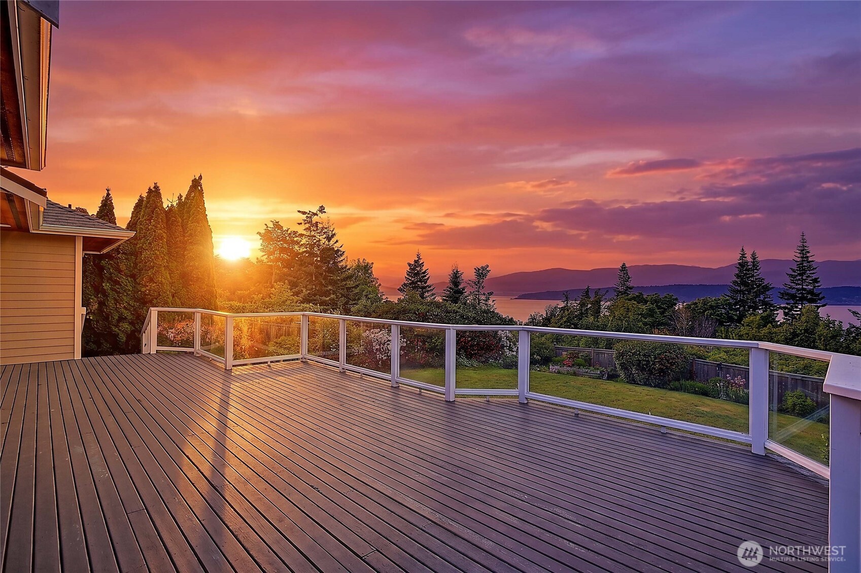 Stunning 3,274 sq ft Sound-view home on a .59-acre lot in Finisterre Heights. Light-filled with elegant entry, tall ceilings, statement making Italian tile flooring, and a massive deck to enjoy panoramic views of Puget Sound, Mt. Baker, and Whidbey Island. Features 3 bedrooms (including den), formal dining room, and a remodeled MIL suite in daylight basement with full kitchen and private entry. Chef’s kitchen with slab granite counters, skylight, and new appliances. Luxurious primary suite with marble bath and walk-in closet. New interior & exterior paint, 3-car garage, long driveway, fully fenced yard, and newer roof (2022). Easy bridge access—no ferry—plus nearby crabbing, boating, and fishing!