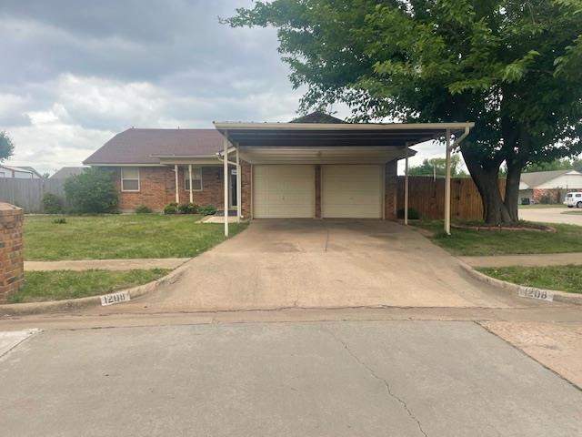 Great home on a large corner lot waiting for it's new owner. Dining area and also bar top seating in kitchen. Pantry in kitchen with refrigerator, dishwasher, electric stove and lots of cabinets. Large living area with fireplace with gas logs and built-in bookcases. Good size primary bedroom with double closets. This home has a storm shelter in garage. Large backyard has a covered patio and a beautiful above ground pool installed last summer. Backyard is fenced with a gate for backyard access. There is a carport on front drive to protect your cars. All window treatments to remain with the home. Home also has an osmosis water system. Seller is providing a one year home warranty for buyer's peace of mind. New carpet installed in the living room and hallway, New roof was installed this week . Home is move-in ready. Come see this home located in Moore's great school district.