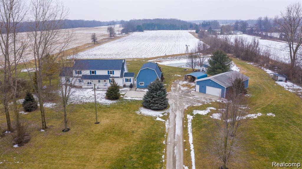 Beautiful custom-built home located just west of Yale, set on an impressive 25.18 acres offering space, privacy, and versatility. Built in 1999, this expansive 3,800 sq. ft. residence features 4 bedrooms and 2 full baths, providing a generously sized layout ideal for comfortable everyday living. The property’s vast acreage creates a peaceful setting with endless possibilities for outdoor enjoyment, recreation, or future use, while the included 32 x 48 ft pole building adds valuable space for storage, hobbies, equipment, or additional needs. This property presents a rare opportunity to own a spacious home paired with substantial land in a desirable location just outside of Yale.