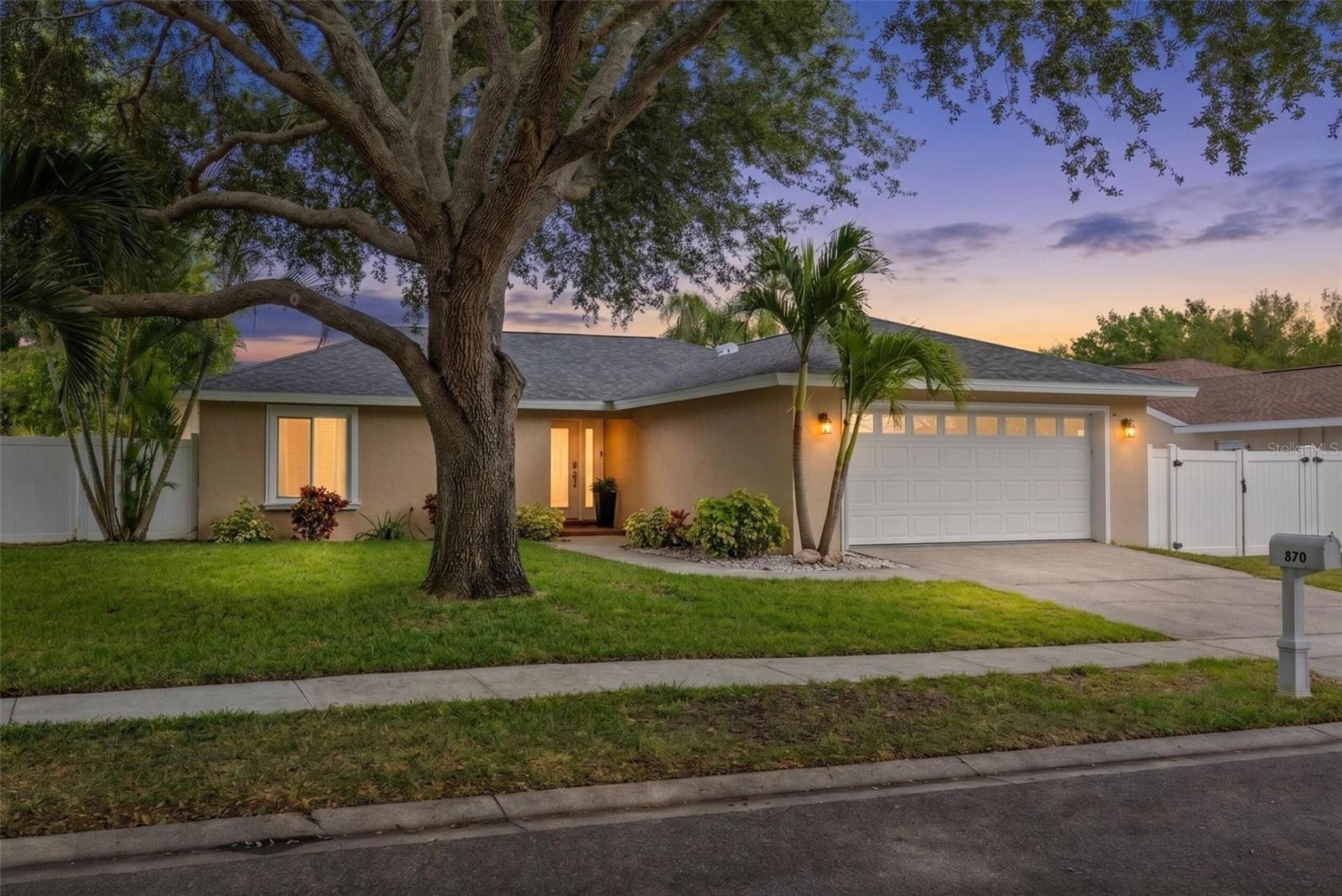 NEW TO MARKET!!! NEW TO MARKET!!! NEW TO MARKET!!! Located in one of Palm Harbor’s most desirable golf cart-friendly communities and zoned for the highly sought-after Palm Harbor University school district, this beautifully maintained home offers the perfect blend of comfort, convenience, and lifestyle. Featuring a highly desirable split floor plan, this residence provides both privacy and functionality, making it ideal for families, guests, or those who love flexible living spaces.From the moment you arrive, you’ll appreciate the pride of ownership and thoughtful upgrades throughout, including a BRAND NEW ROOF, newer A/C, newer water heater, updated electrical, hurricane-impact windows and doors installed in 2021, and a newer vinyl fence for added privacy and security, a Smart Home powered by Alexa. The spacious two-car garage offers ample room for vehicles, storage, and hobbies.Situated in Flood Zone X for added peace of mind, this property provides an exceptional opportunity to enjoy Florida living at its best! One of the home’s standout features is the oversized yard, offering endless possibilities for entertaining, gardening, or creating your dream outdoor oasis—with plenty of room to add a pool. A full front and back four-zone irrigation system keeps the landscaping lush year-round, while a generator plug adds practical preparedness.Beyond the property itself, the lifestyle here is truly special. Enjoy a strong sense of community with wonderful neighbors and frequent outdoor gatherings that create a welcoming neighborhood atmosphere. The location is hard to beat—just minutes from vibrant downtown Palm Harbor, top-rated dining, shopping, entertainment, and a short drive to some of Florida’s most beautiful Gulf beaches.This move-in-ready home combines upgraded peace of mind, spacious living, and an unbeatable location, making it far more than just a home—it’s a lifestyle opportunity in one of Tampa Bay’s most sought-after communities. Don’t miss your chance to make it yours.