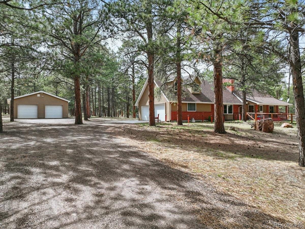 This is a really unique horse property. Completely renovated and updated inside. So quiet outside, you'll hear nothing on your 5.18 heavily forested acres but the wind blowing through the trees. Single owner for the last 33 years, so well loved and well maintained. There's a double bay RV garage that could also be used for stables, as the property is zoned for horses. The RV garage will also house at least six cars and everything you need to maintain them. The is an overhead lift in the RV garage as well, which the sellers used to build an airplane in this space! 
There are greenhouses, a large storage shed, gardens and dog runs and more, everything you need to make this your perfect paradise in the pines.
Inside this home is practically brand new. Please see the attached upgrades list for a full list of all the updates but everything was redone. Seller is putting in a new leach field as well, which will be completed prior to closing. 
Plantings are on a drip irrigation system, and three sides of the property are fenced. The entire property has an invisible fence, however it will need a repair that the seller has not tackled yet. The Trane AC and furnace are new and the Hydro Massage jetted tub in the primary bath reheats the water as it recirculates. 
The best thing about this property is the privacy. You can barely see the home from the street through the trees and the area is pin-drop quiet. It's located right in the heart of Monument, close to schools, shopping and major traffic corridors, and yet, you feel like you're in the middle of nowhere. It is QUIET. It is PRIVATE. It is SPECIAL. 
Every convenience, every luxury, with everything you need to truly enjoy your Colorado lifestyle. 
D-38 schools