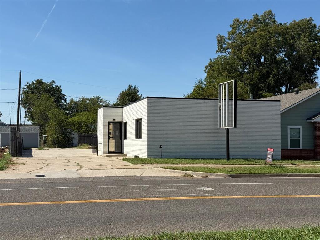 Retail Space Available For Lease NOW! Freshly remodeled retail space in the heart of Norman. White exterior paint, gray interior paint brick and walls, new trim throughout, office space includes reception area, 4 private offices, 1 conference room, kitchen area with dishwasher, fridge, on a huge gated and fenced lot! This is a gross modified lease. $2,200 a month, $2,200 security deposit. Owner/Broker.