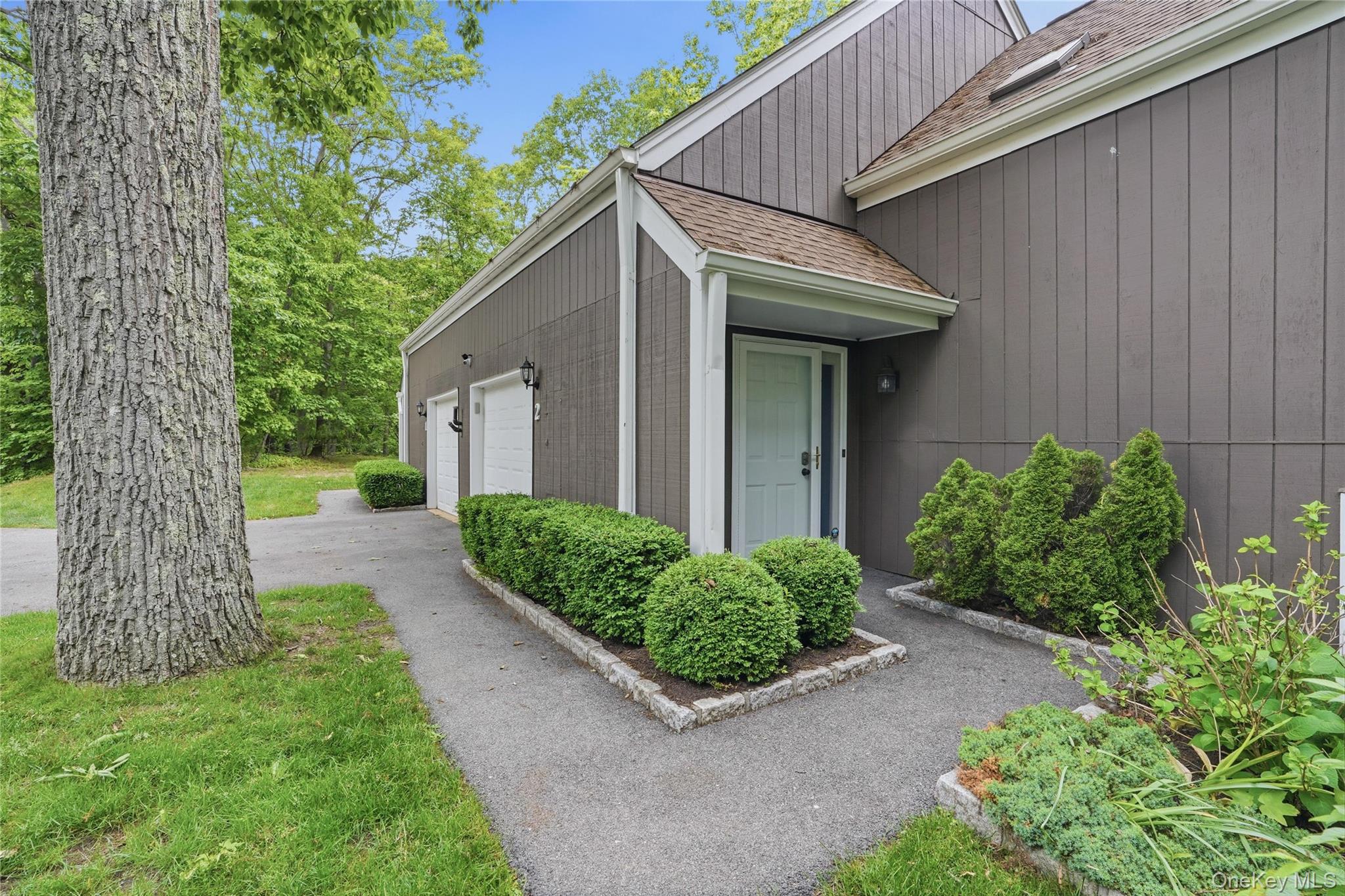 Welcome to Apple Hill Farm, sitting on highly desirable, 37+ Wooded Acres. Where calm meets comfort. This corner Townhome, located in a cul-de-sac for added privacy, features a manicured lawn and a carefully curated garden. Experience modern elegance in this home, with high ceilings, lots of Windows and Skylights that bring abundant natural daylight and sunlight indoors. It has 3 Bedrooms and 2.5 Bathrooms, many updates throughout the home, including the exterior deck. The Living Room has custom built-ins. An inviting Dining Room for memorable meals and an Eat-in-Kitchen with quartz countertops and stainless steel appliances, both rooms have sliding doors onto the deck. It features hardwood floors throughout, many closets and storage spaces. The Primary Bedroom has a Juliet Balcony, En-Suite bathroom with Double sink vanity, Second Bedroom with Skylights, Third Bedroom with Hallway Bathroom.  Close to Train, Close to Downtown Dining and Shops, Close to Schools. Property includes 1-Car Attached Garage with Driveway for 1 additional car. Amenities include: Inground Pool and Tennis Courts.