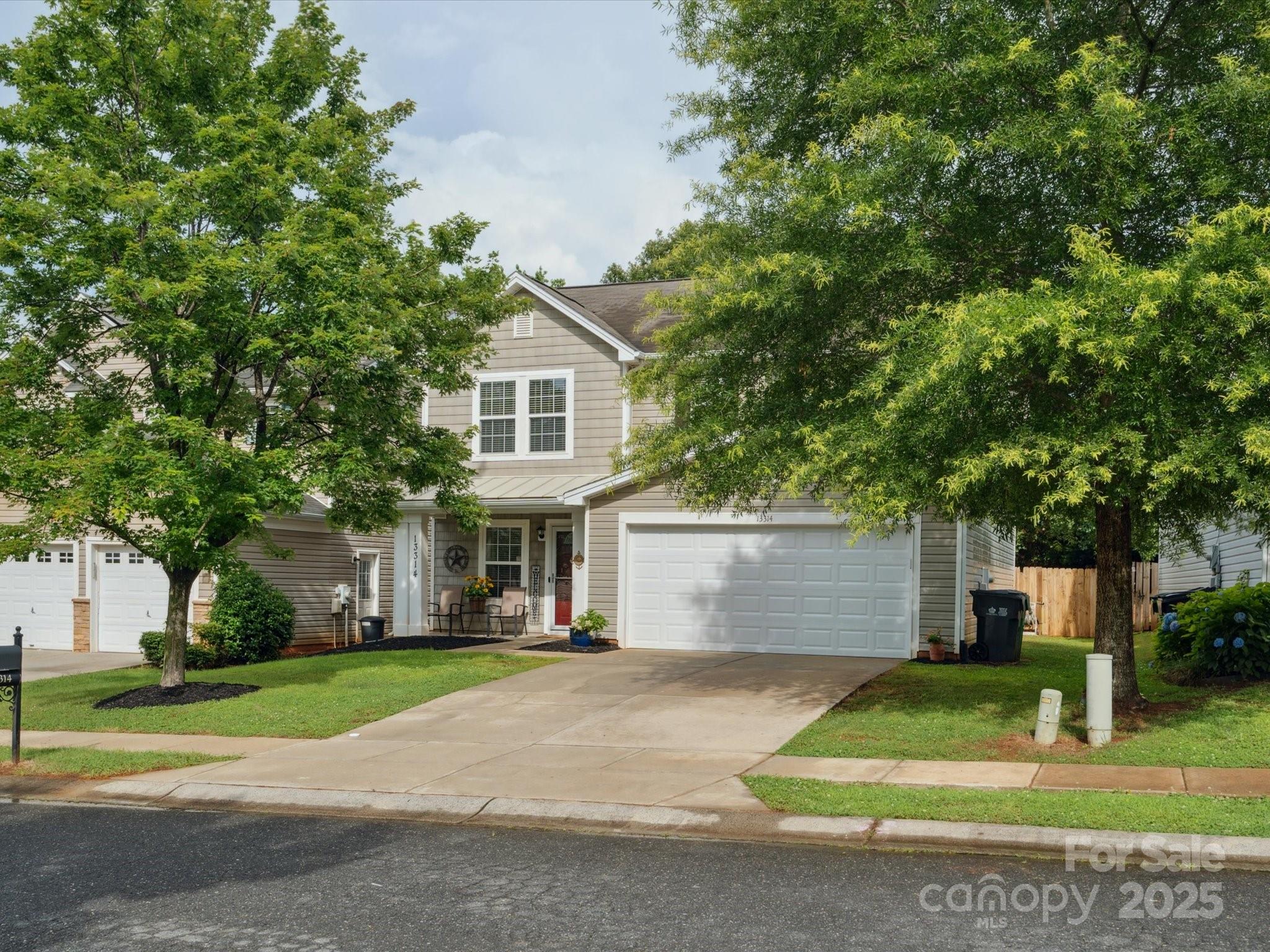 This well-maintained home in the Hamilton Lakes community features an open kitchen and a great room concept, which is ideal for entertaining guests. The expansive kitchen boasts ample cabinet and counter space, a pantry, and an island w/bar seating. Upstairs is the primary suite w/lg walk-in closet, tray ceilings, a private bath with a separate shower, and a garden bathtub, as well as two additional bedrooms, a full bathroom, a flexible loft space that can serve as an office/sitting area, and a laundry room. Spacious, extended patio with covered area that overlooks a fully fenced backyard. Upgraded molding in multiple areas, complemented by LVP flooring throughout most of the living spaces, and fresh paint. Hamilton Lakes offers a community pool and a cabana. The location provides convenient access to the Rivergate Shopping Center, shopping, dining, I-77, I-485, and easy commutes to Charlotte or the airport. Professional Photos coming. Move in ready!
