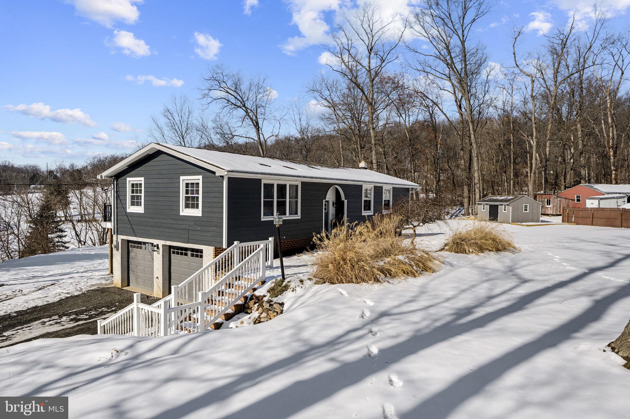 AUCTION DATE MONDAY, APRIL 6, 2026 AT 5PM. LISTED PRICE IS AN OPENING BID ONLY AND IS NOT INDICATIVE OF THE FINAL SALE PRICE. REAL ESTATE: Country stucco/aluminum split foyer dwelling, 1952 SF, eat-in kitchen w/island, dining area, living room, foyer w/open banister stair, 4 bedrooms, 2 full baths, elec. BB heat, finished bsmt. w/2nd kitchen area, family room & office area, insulated/tilt windows, front patio 16x20, large rear deck 20x32 w/patio area, low maintenance exterior w/covered soffit, fascia, built-in 1-car garage w/laundry area & utility shed 12x20 all on 1 ACRE m/ rural lot w/mature trees, lawn & garden area, professional landscaping, on-site well & septic. NOTE: Ideal family property on rural acreage lot. House is well-maintained & move-in condition. Convenient location, minutes to New Holland, East Earl & Intercourse w/easy access to Rts. 340, 897 & 322. Terms 10% down, balance 90 days or before. Personal inspection by appointment or open house Sat., March 21, 28 & April 4 from 1 to 4 PM.