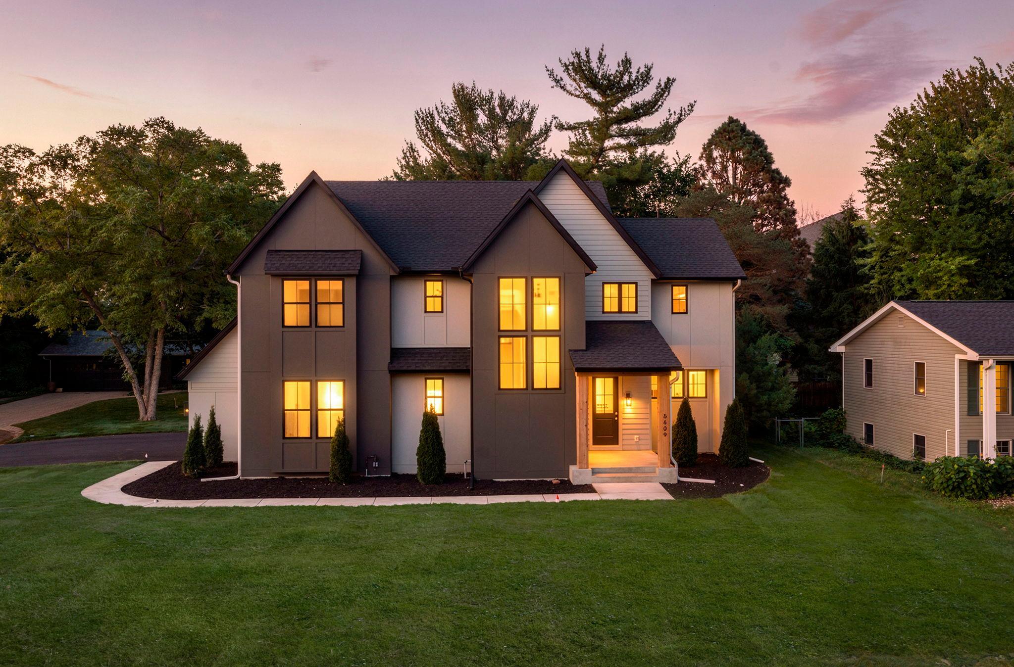 Exceptional new custom-built home by Stone Cottage Construction on a desirable corner lot in a sought-after Edina neighborhood! This stunning two-story home offers 6 bedrooms and 5 bathrooms with thoughtful design and high-end finishes throughout. The gourmet kitchen features a center island, soft-close cabinetry, Thermador Appliances and a spacious walk-in pantry—perfect for entertaining and everyday living. The open-concept main level showcases beautiful white oak hardwood floors, Andersen windows, and a welcoming Great Room with a gas fireplace. A versatile main-floor bedroom provides flexibility for guests or a home office. Upstairs, all four bedrooms include walk-in closets, and the luxurious primary suite features a spa-inspired ensuite bathroom. The finished lower level offers a generous family room, wet bar, sixth bedroom, and ¾ bath—ideal for gatherings and relaxation. The insulated garage has a rough-in gas line for a heater as well as a floor drain which adds convenience year-round. Nestled in the award-winning Edina School District, this home combines quality craftsmanship with timeless style.