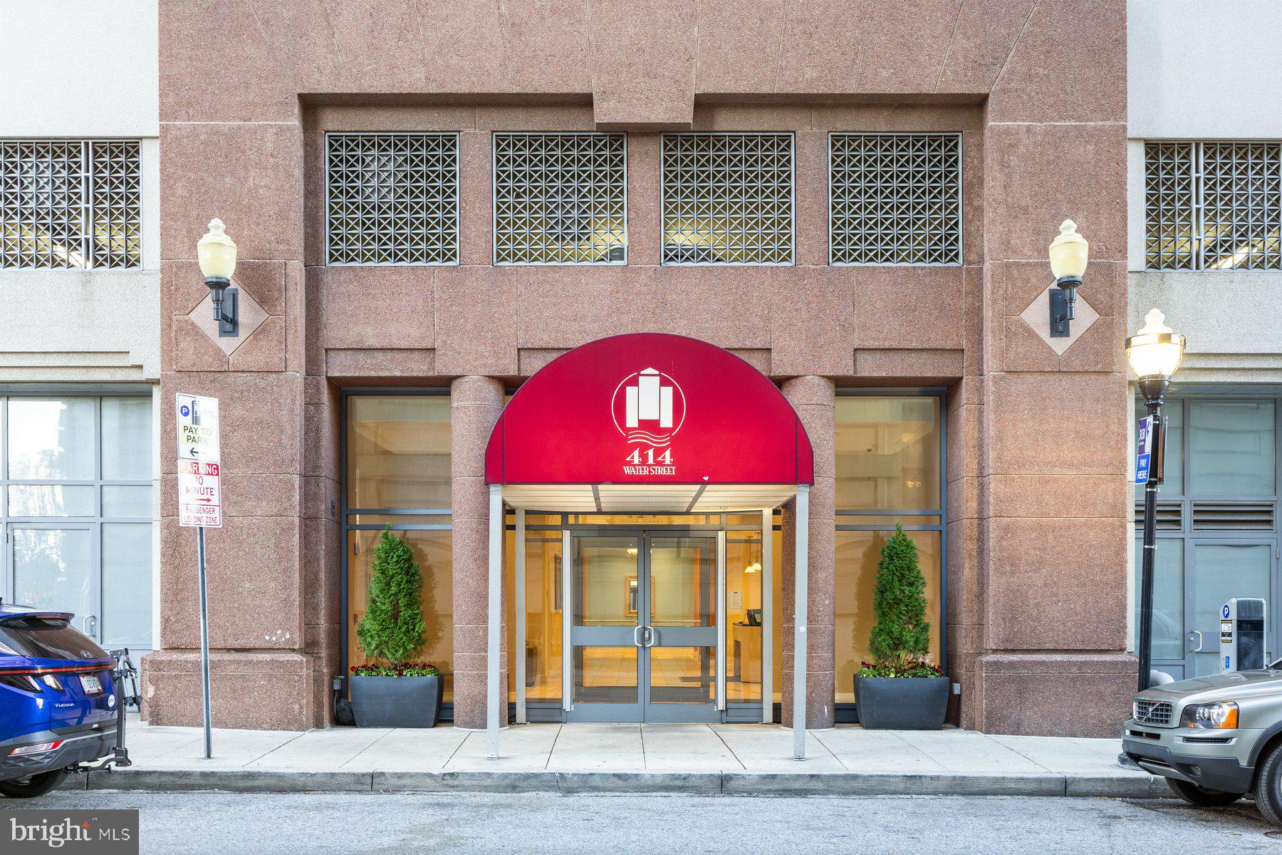 Available immediately for a minimum one year lease.  Beautifully updated condo in an amenity rich building in a great location with parking! 2 Bedroom, 2 full bathroom home with laminate wood floors throughout, and balcony with great city views! Stainless steel appliances and granite counters in the kitchen opens to the dining and living area.  Building amenities include an outdoor pool, exercise room, secure access and parking garage. Water is included in rent, but all utilities are the responsibility of the tenant. One assigned parking space in secure garage is included, but tenants can also choose to purchase additional parking spots if they would like, directly from the building. The unit also includes an (approximately) 6' x 6' x 9' storage unit, located on the Mezzanine (M) floor. Pets possible. Dogs have to be registered with the building with a $30 flat fee annually, plus a $35/pet monthly rent.  The $250 building move-in fee is refundable.