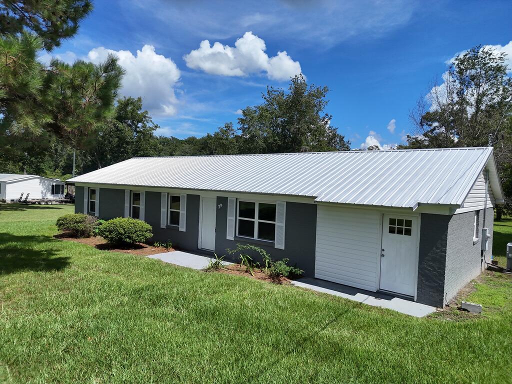 Great 3BR/1.5 Bath home on Hwy. 319! Classic brick home on nearly a full acre of land. Enjoy peaceful country views in this beautifully remodeled home. Recent improvements include enhanced curb appeal, enclosed carport, and newly enclosed washer and dryer room. Ready for you to move right in!  Call your favorite agent TODAY for a closer look!