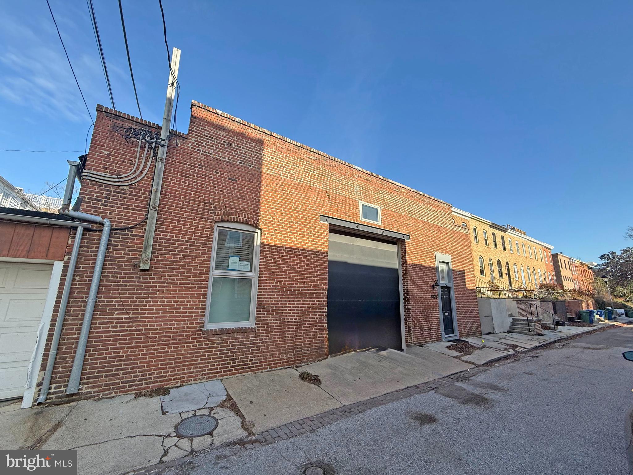 Two-level condo located 2 blocks from Federal Hill Park, featuring a rare private garage. This home offers hardwood floors, a cathedral ceiling, plantation shutters, and a kitchen with a separate dining area. The primary bedroom includes built-in storage. The second-floor loft provides flexible space suitable for a second bedroom, den, or home office.