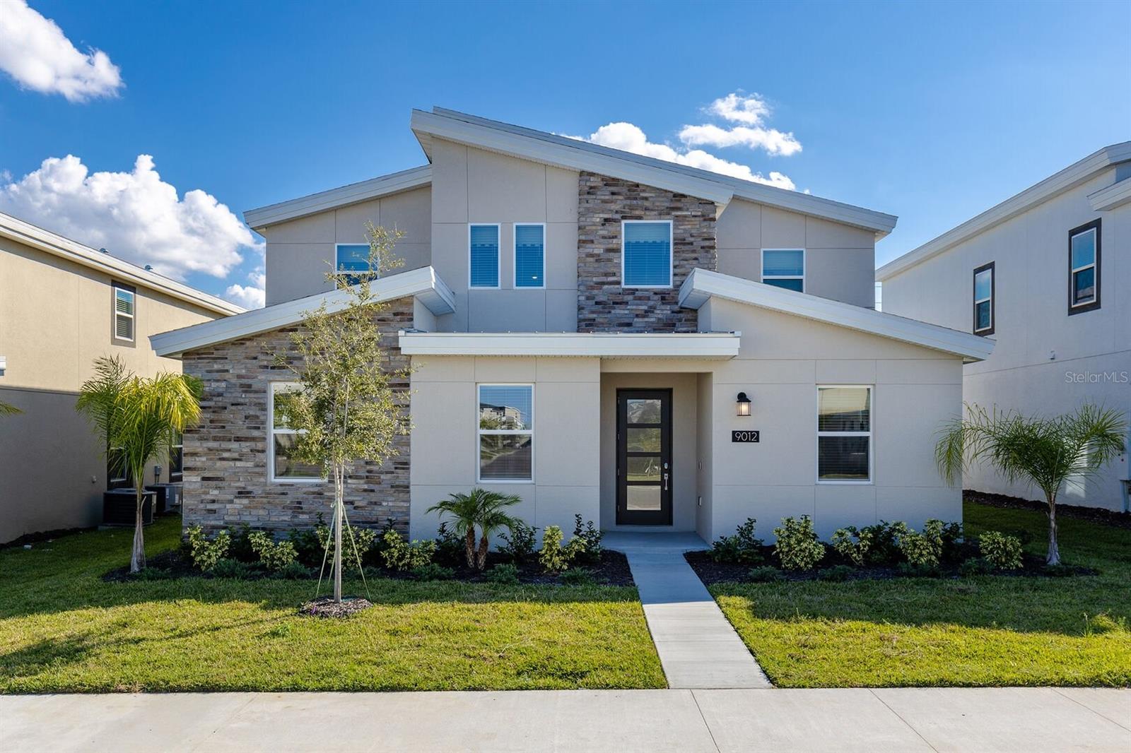 Step into one of the most sought-after vacation homes in Champions Gate! A property that’s equal parts luxurious, playful, and unforgettable. This home has earned its popularity with guests for a reason, and the moment you walk in, you’ll see why. Kids get their very own entertainment paradise, starting with the Marvel Avengers–themed game room complete with LED lighting, top-tier arcade games, and two Xbox consoles. And then there’s the showstopper: the incredible jungle treehouse bunk room. As you step under the canopy, twinkling “fireflies” (LED lights) glow among the trees, creating a magical nighttime scene. Five custom-built bunks sleep up to ten lucky kids, each with its own lantern for cozy nighttime adventures. Crawl into the lower level where a private gaming nook and PS4 await. Throughout the home, you’ll find quartz countertops, quality furnishings, and professional décor designed to stand up to high occupancy without sacrificing style. Outside, the fun continues with a saltwater pool and hot tub, all with no rear neighbors for added privacy. And location? It doesn’t get better. You’ll be steps from Champions Gate’s newest water park, and just moments from the Champions Gate Golf & Tennis Club, Disney, Universal, and all of Orlando’s world-class attractions. For anyone building a standout vacation rental portfolio, this home is the one you don’t want to miss. It delivers the wow factor, the amenities, and the income-earning potential that make it a star performer in the short-term rental market.