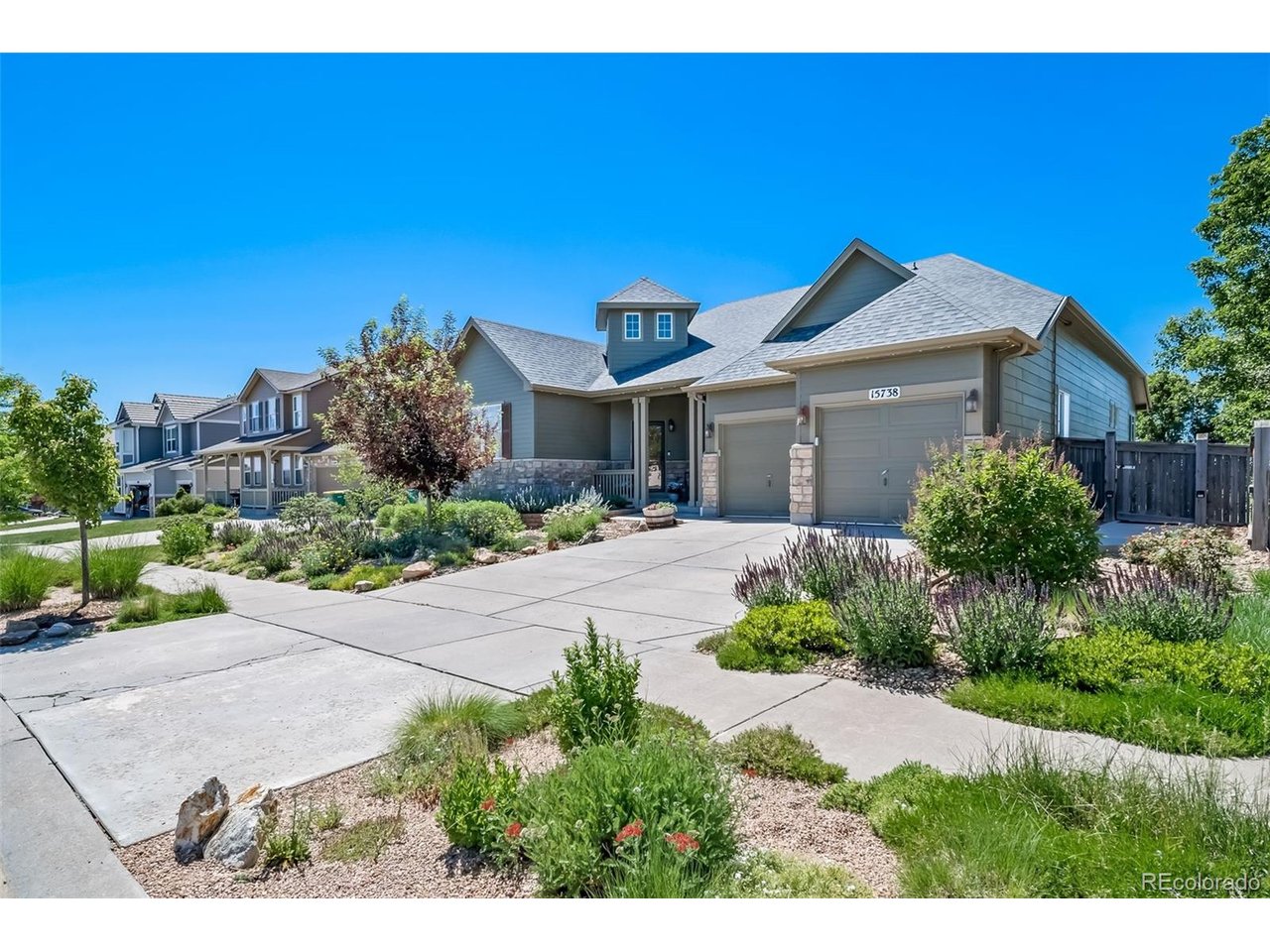 Rarely available 5-bedroom, 4-bath ranch home backing to open space with breathtaking views of rolling hills and Pikes Peak! This stunning move-in-ready home offers an exceptional blend of flexibility, updates, and lifestyle in the highly sought-after Horse Creek community. The main level features a welcoming formal entry, dedicated dining room, private study with glass French doors, and a spacious open-concept living area designed for everyday comfort and entertaining. The beautifully remodeled kitchen showcases white quartz countertops, resurfaced cabinetry, and brand-new stainless steel appliances, all overlooking the expansive open space beyond. The primary suite is a true retreat with vaulted ceilings, stunning views, a luxurious 5-piece bath, updated cabinetry, new glass shower enclosure, and an oversized walk-in closet. Luxury vinyl flooring flows throughout, while recent improvements-including newer roof, furnace, A/C, water heater, interior paint, and exterior paint-provide peace of mind for years to come. The fully finished walkout basement offers incredible versatility with its own private entrance, full kitchen, living and dining area, three bedrooms, two bathrooms, and dedicated laundry space. Perfect for multigenerational living, guests, or potential rental income. Enjoy Colorado living outdoors with a low-maintenance fenced backyard featuring turf, a large patio, and space for gardening. Paid-off solar panels provide significant energy savings. Residents enjoy access to neighborhood amenities including a community pool and miles of scenic trails.Homes offering this combination of views, updates, and flexible living space rarely come available-don't miss this exceptional opportunity!