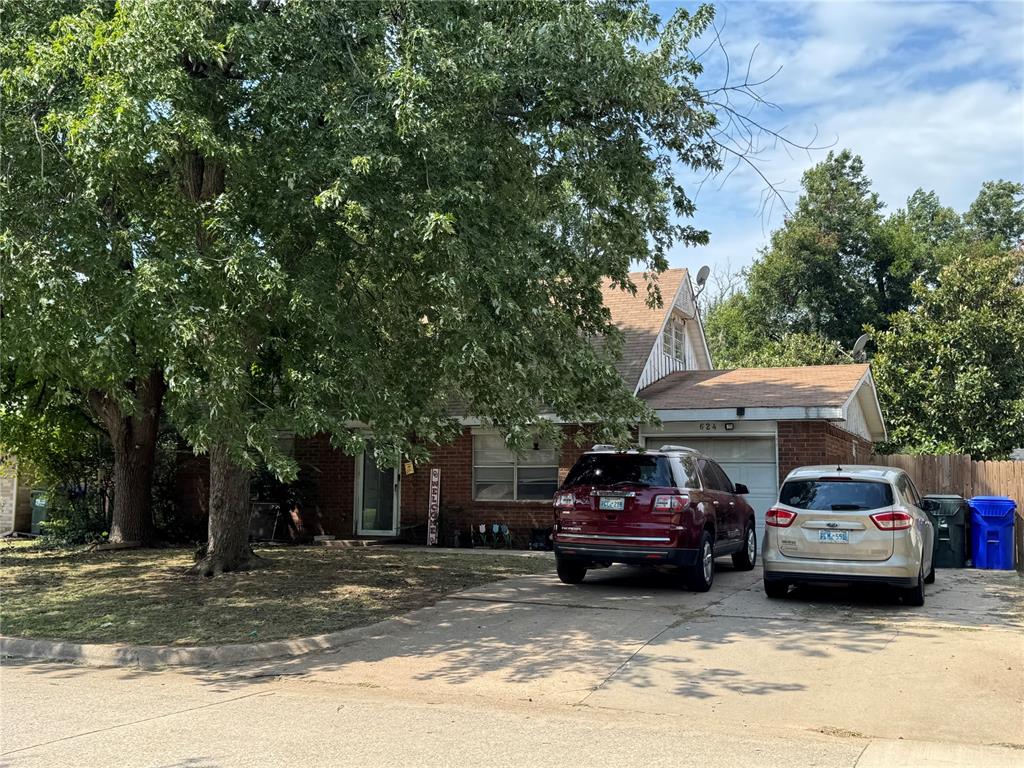 Investor Special Near OU! This 2-story, 4-bedroom, 2-bath home offers incredible potential just minutes from the University of Oklahoma. Featuring 2 bedrooms 1 bath upstairs and 2 bedrooms and 1 bath down, plus a bright sunroom, this property is ready for your vision. Sitting on a large lot shaded by mature trees, it provides space and character rarely found so close to campus.  Backs to Kiwanis Park!  Storm shelter in backyard!  Home does need TLC—perfect for investors or buyers looking to add value in a prime location!