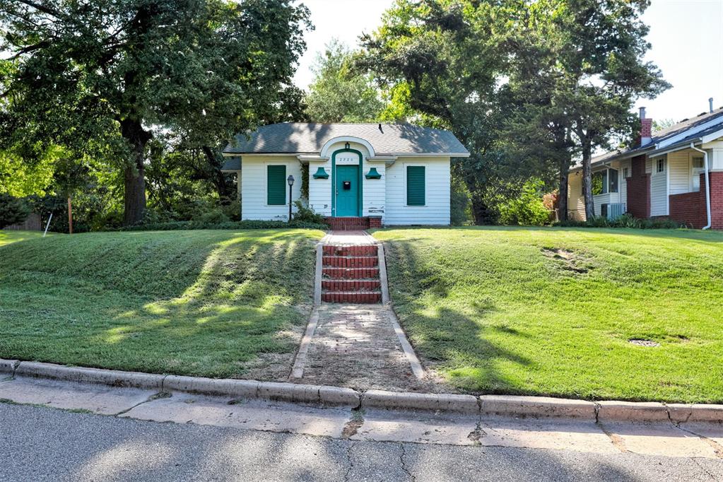 Step into timeless charm with this delightful 2-bedroom, 1-bath home nestled on a large corner lot directly across from the peaceful green space of Sparrow Park. With 1,117 square feet of living space, this property offers warmth, character, and plenty of potential.

Much of the home's original charm remains intact—from classic finishes to vintage details—making it a rare gem for those who appreciate craftsmanship and authenticity. Key updates include a new roof (2021), central AC (2021), and a new sump pump in the basement, providing peace of mind while preserving the home's historic appeal.

Whether you're relaxing in the sunlit living room, envisioning updates in the spacious kitchen, or enjoying the wide-open yard, this home is full of opportunity. Ideal for first-time buyers, downsizers, or investors looking to restore a classic.

Don't miss your chance to own a piece of history in a fantastic location!