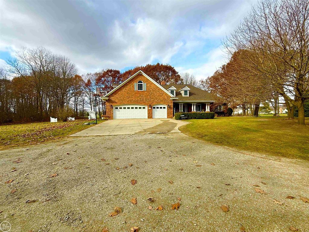 ONE OF A KIND!! 12.14 heavily wooded acres with 475 feet of river frontage on the Belle River, hidden back off a cul de sac w/city water/sewer/gas, nestled among mature trees is this sprawling custom 3556 sq ft ranch home, 4 car heated/finished att. garage w/multiple doors front/back, large covered front porch, private covered rear porch w/patio overlooking yard & river, huge open great room w/pan ceiling, fireplace, hdwd floors & lots of windows, gourmet kitchen w/loads of custom cabinets, large island w/granite counter, sub-zero fridge, fireplace, desk area & appliances, walk-in pantry, large dining area overlooks backyard, 1st floor laundry w/washer & dryer, french doors off entry way lead to den/office, 2nd & 3rd bedroom w/walk-in closets, primary bdrm w/pan ceiling, laminate flooring & glass door leading to covered rear porch, mstr bath w/dual sinks, stall shower, jetted garden tub, huge walk-in closet, finished bsmt has 3rd fireplace, entertainment area, gaming area, storage room, 3rd bath w/shower stall, workout area w/utility sink, huge finished bonus room above garage (41x18) w/sink area, office area, 2 (mini-splits) for heating/cooling, ideal for work at home or 4th bedroom, parking area ideal location for future pole barn, enjoy trails in the woods, East China Schools, many more features...won't last...here you can have it all.