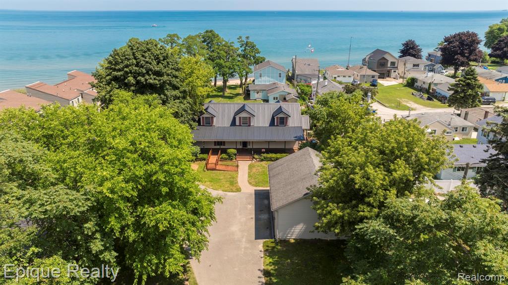 Welcome to your Lake Huron dream home! This stunning 2,300 sq ft lakefront retreat offers breathtaking water views from every room and direct access to a walkout sandy beach—perfect for morning strolls along the shoreline all the way to the nearby Lakeport State Park. With 3-4 spacious bedrooms and 3 full baths, there’s plenty of room for family and guests.—-

The open-concept kitchen, dining, and living areas are designed for seamless entertaining, all while enjoying panoramic lake views. The main floor features a serene master suite and convenient laundry, making single-level living a breeze. —-This thoughtfully designed home features step free entry, white doorways, and a barrier free layout, offering comfort and ease for a variety of mobility needs. —-Whether you’re looking for a year-round residence, a seasonal getaway or a profitable short-term rental, this rare Lake Huron gem offers the perfect blend of comfort, privacy, and natural beauty. —-Highlights include:  
Oversized 3-car garage with 10’ tall doors—perfect for boat or RV storage.  
—-Durable, waterproof luxury vinyl flooring throughout.  

—-Energy-efficient windows and mechanicals.  

—-Thoughtfully furnished and move-in ready.  

—-High-speed internet available.  
—-Pet free & Smoke free home.
—-Plenty of parking and outdoor space for family gatherings or summer fun.  

—-Quick access to Lexington, Port Huron, local marinas, I-94 & I-69 and the beautiful Lake Huron shoreline. A rare opportunity to own a walk out Sandy Beach lake property.  Walk the shoreline North to The Lakeport State Park.  
—-30' Deeded Private Beach access.  

—-Furnishings negotiable BATVAI