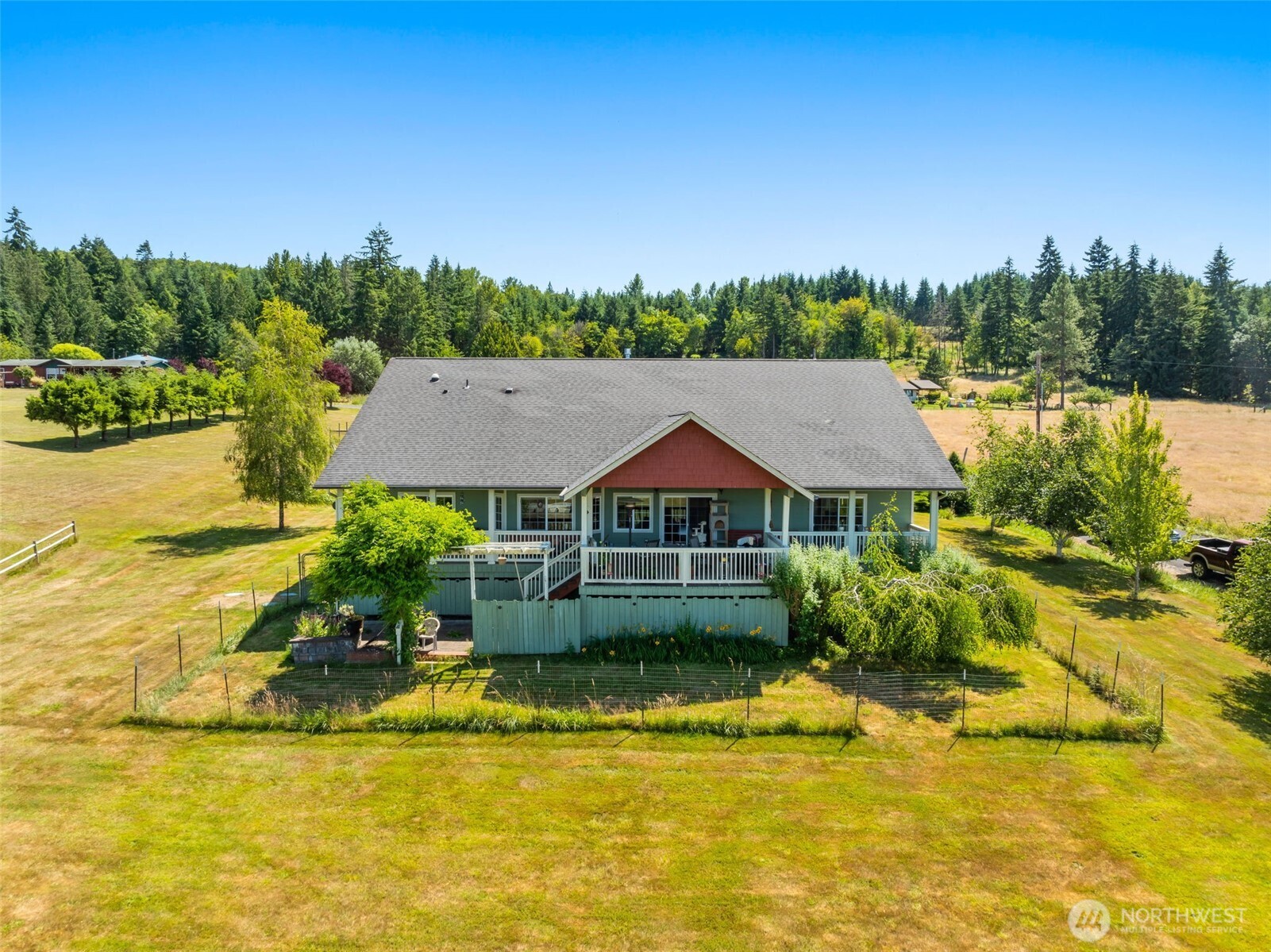 Welcome to your incredible Ranch style open concept home on over 8.5 acres. This 2342 square foot rambler is a perfect combination of function and luxury, with 4 bedrooms and 2 full baths in the main home and a main living area that is perfect for entertaining. Stainless steel appliances, wide plank floors, large bedrooms and a primary suite with walk in closet and jetted tub. Along with the beauty inside, covered patios off the front and back of the home provide year round comfort and peace to enjoy nature's beauty. If you need extra space, there is a 2100+ square foot shop just a few steps out the front door, a storage loft, a full RV hookup with electric and water as well as another fully finished bedroom and 3/4 bath. Come see us today!