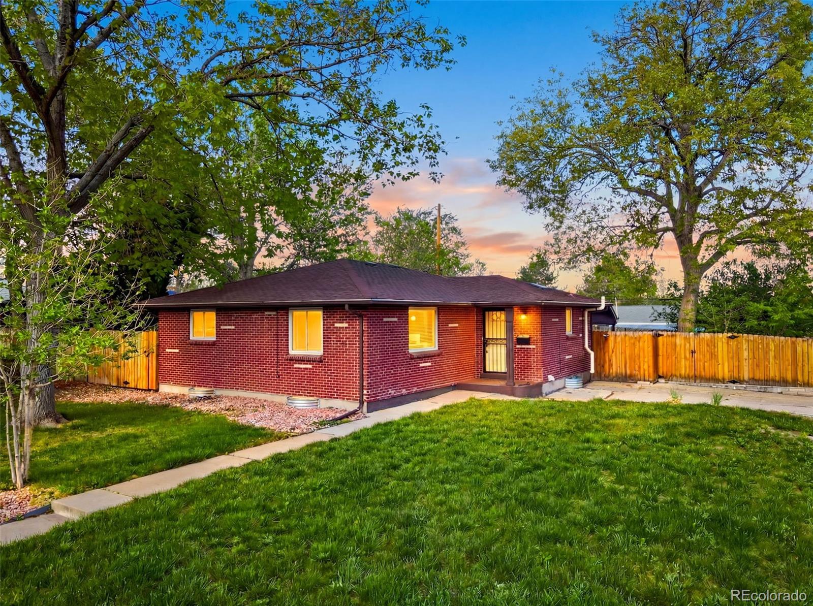 Fully updated all-brick ranch on a prime corner lot in the heart of Lakewood. This move-in ready home checks every box — refreshed kitchen and bathrooms, new windows, plush carpet, fresh basement flooring, and a completely rewired electrical panel. Outside, enjoy a brand-new privacy fence, LeafFilter gutters, new sod, irrigation system, and a custom cement fireplace ideal for entertaining. Major mechanicals done: premium roof, new water heater, updated plumbing, and radon mitigation. No HOA. Minutes to Belmar, local parks, and easy access to Downtown Denver and the mountains.