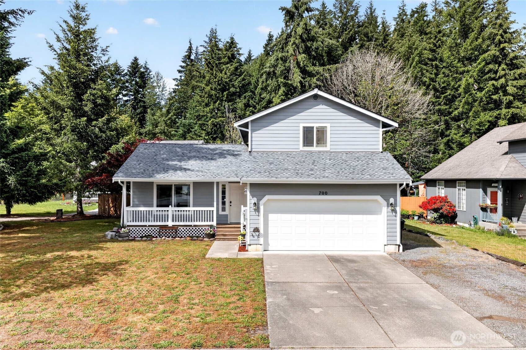 Your gateway to the outdoors starts here—an updated, move-in ready home just minutes from Alder Lake, hunting opportunities, and Mount Rainier. Bright, crisp, and filled with natural light, this beautifully refreshed Eatonville home is loaded with updates. The inviting floor plan features soaring cathedral ceilings and new luxury vinyl plank flooring throughout the main level. Recent improvements include a newer roof (2024), fresh exterior and interior paint, new carpet, updated interior trim, newer lighting, and a new hot water tank.    The kitchen is equipped with newer stainless-steel appliances, while the efficient heat pump provides year-round comfort. Outside, enjoy a newly fenced backyard, spacious corner lot, and convenient RV parking with plenty of room for recreational vehicles, boats, and outdoor gear.    Ideally located close to schools, shopping, and everyday amenities. Outdoor enthusiasts will appreciate being just 10 minutes from Alder Lake for fishing, boating, and water recreation, with nearby hunting opportunities, and less than 30 minutes from Mount Rainier National Park for hiking, camping, and year-round adventures. This well-maintained home offers the perfect blend of comfort, convenience, and the Pacific Northwest lifestyle. One year home warranty included for peace of mind. Don't miss this opportunity!