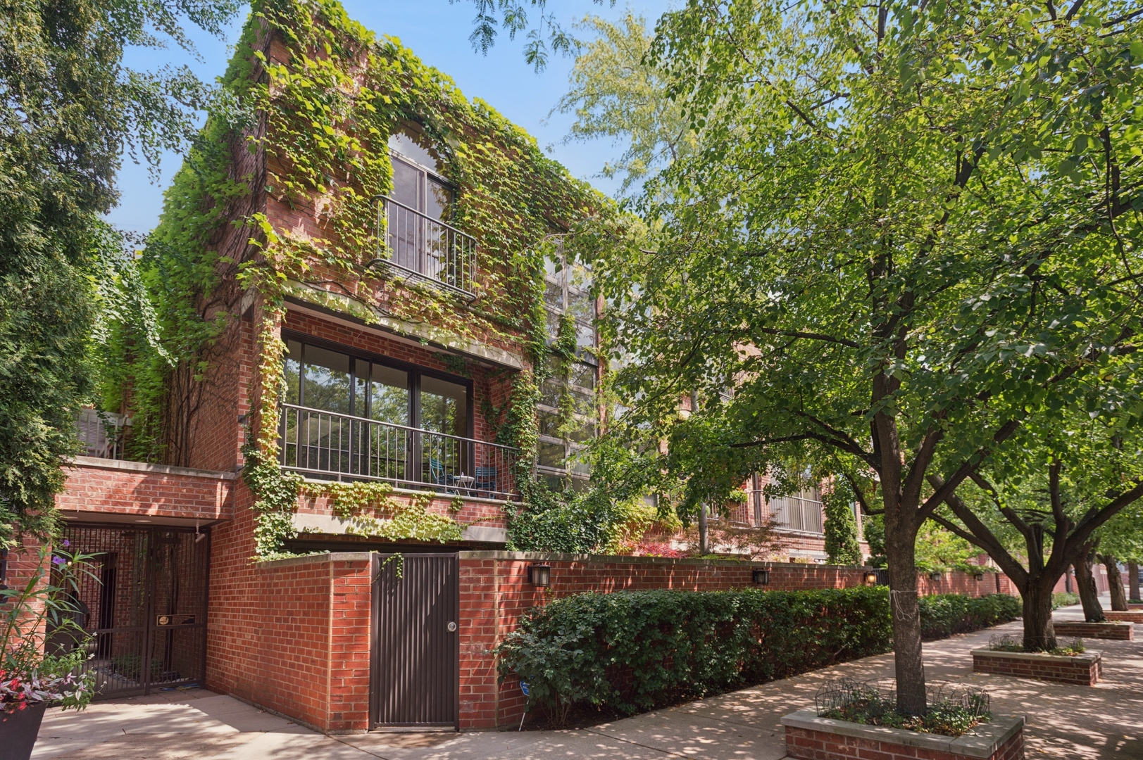 Rarely available and perfectly situated in the heart of Lincoln Park, this beautifully maintained townhome offers elegant, low-maintenance living in an intimate, gated community on one of the neighborhood's most charming streets. With a wide, open layout, the main floor is ideal for entertaining - the kitchen, living room, and dining area flow seamlessly out to a large, private, professionally landscaped terrace, creating a true indoor-outdoor experience. Upstairs, you'll find three spacious bedrooms and two full bathrooms, including a sunlit primary suite. The lower level adds valuable versatility, with a fourth bedroom or home office, a bonus family room, full-size laundry room and abundant storage throughout. Located in the highly coveted Lincoln Elementary School District, this home is just steps from the lakefront, Lincoln Park Zoo, Oz Park, Francis W. Parker School, and some of the best shopping and dining in the city. With timeless architecture, a prime location, and a flexible layout ideal for modern living, this is a rare opportunity to own a special home in one of Chicago's most desirable neighborhoods.