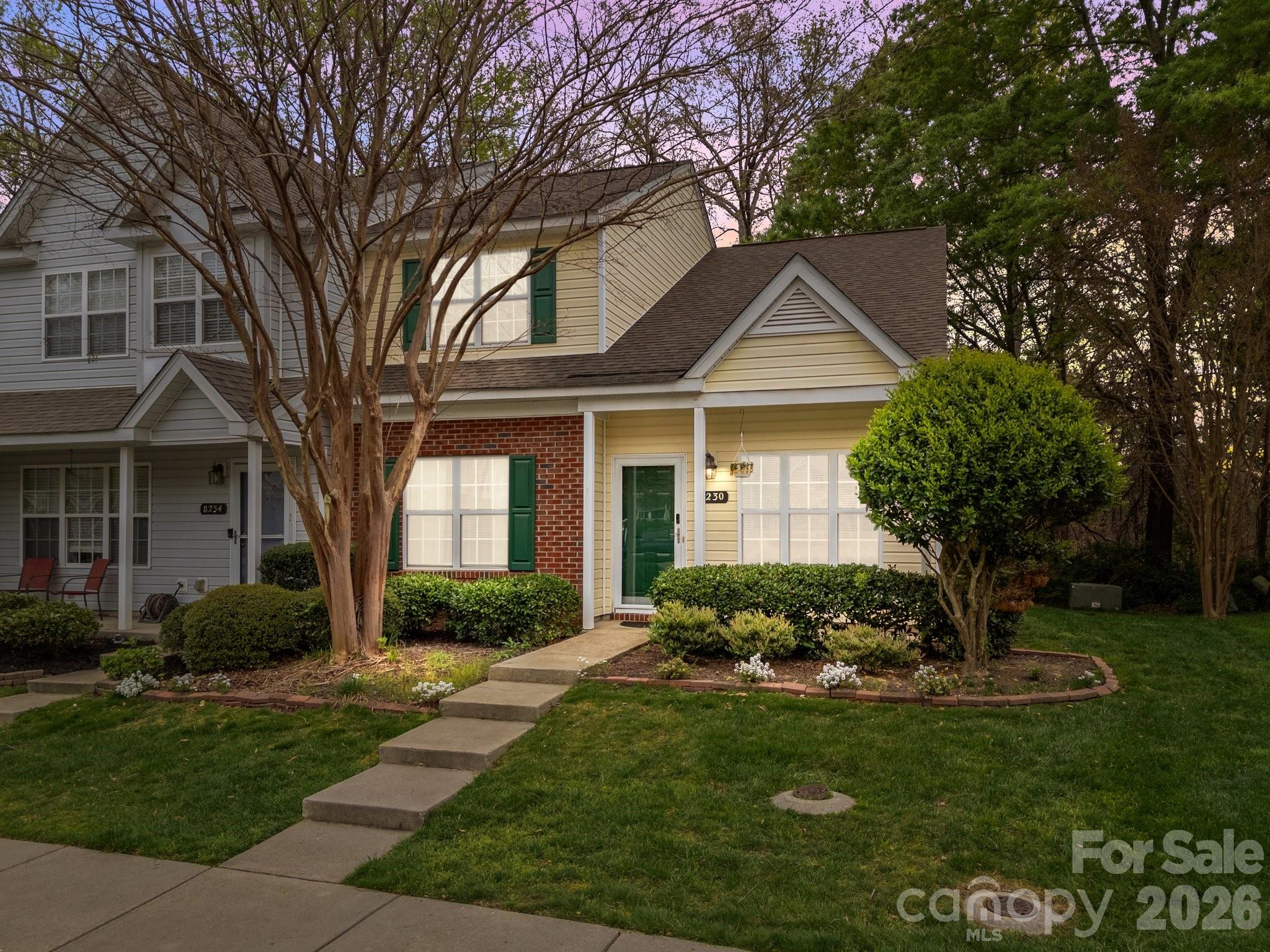 Beautifully updated end-unit townhome with a main-level primary suite, move-in ready!Recent updates include: new HVAC, all-new flooring, a stylish farm sink, stainless steel appliances, and fresh paint throughout. Light-filled and move-in ready, this home blends comfort with an unbeatable location. The remodeled kitchen shines with crisp white cabinetry, generous storage, and a breakfast bar for casual seating flowing seamlessly into the dining area and a sun-flooded living room that's perfect for everyday living and entertaining. The primary bedroom is conveniently located on the main floor with an attached full bath and spacious walk-in closet. Upstairs you'll find two additional bedrooms plus a full hall bath, ideal as guest rooms, a home office, or a playroom. Out back, enjoy a private patio perfect for grilling, plus a grassy area and tree lining for added seclusion. Two dedicated parking spaces sit right at your door, and the home is tucked into a peaceful alcove of the community for added tranquility. Community amenities include an outdoor pool and a walking trail around the community pond. Ideally located just minutes from the highly ranked Birkdale Village and Lake Norman, you're surrounded by endless shops, dining, entertainment, and water access, with quick interstate connections to Charlotte and Huntersville. Easy living in a prime location, don't miss it!