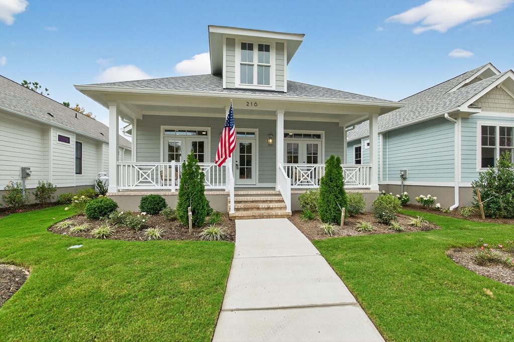 The Chesapeake Cottages are a collection of new homes crafted by Virginia Builders. The Pearl is a coastal-inspired single family home, offering the perfect blend of modern amenities and Eastern Shore elegance. It's a perfect second-home beachside retreat or full-time residence for those looking to right-size and simplify. The Pearl has wonderful outdoor living areas, including a huge 30' wide covered front porch that opens onto a park-like setting. Features include quartz counters, custom cabinetry, tiled showers, tankless water heater, washer/dryer, outdoor shower and outdoor storage space. Recently added upgrades include a detached 2-car garage, Ann Sacks tile in owner's bath, upgraded kitchen hardware, lighting, and cabinetry to ceiling, Eldorado stone fireplace, and more!