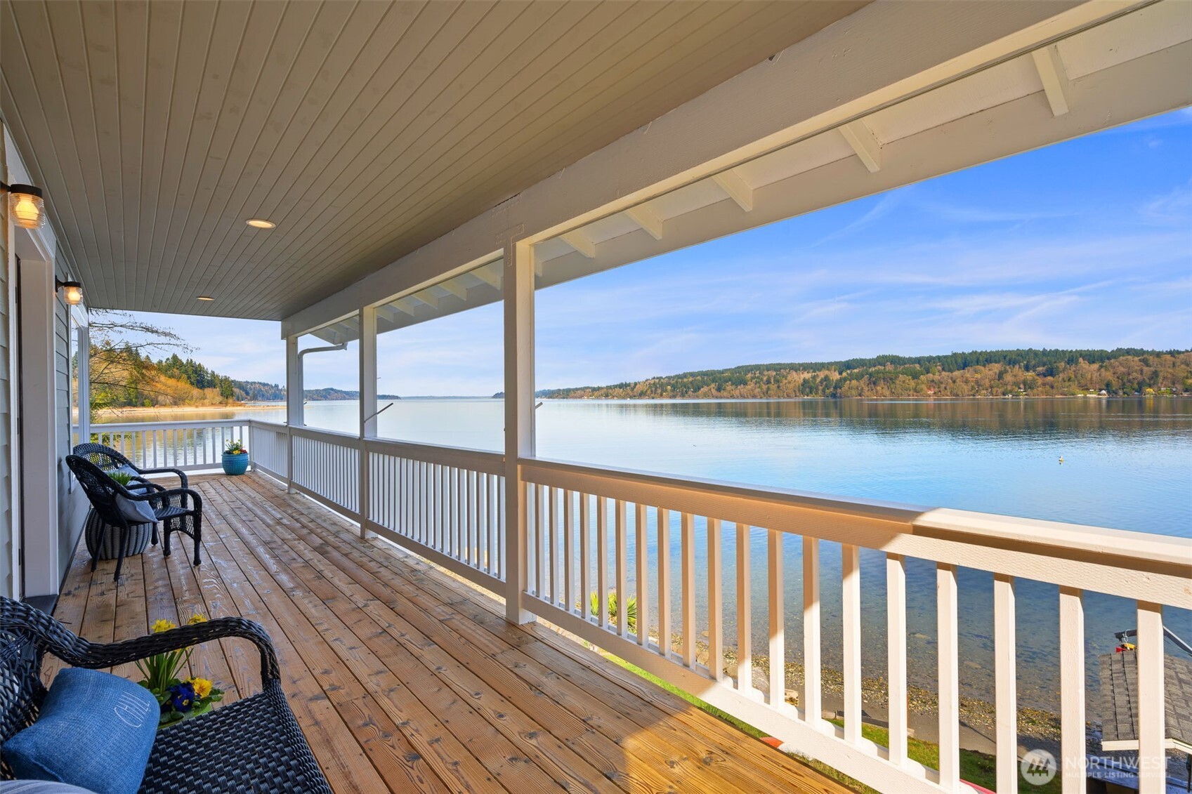 Enchanting low bank waterfront retreat on the shores of Colvos Passage is THE definition of seaside living.  A gently winding road leads to your private paradise where life slows down in the most beautiful way.   140 ft of sandy beachfront, your own creek flowing to the water's edge, & nearly half a mile shoreline to stroll w nothing but trees & wildlife every day are an invite to live your best life.  The inviting cottage style home is its own breath of fresh air where light pours in framing panoramic views & covered decks on each level ensure you never miss the action of the ships, boats, whales & wildlife in the Passage.  Huge shop down below, boat house & electric winch for beach toys, mooring buoy & more!  You have Arrived!