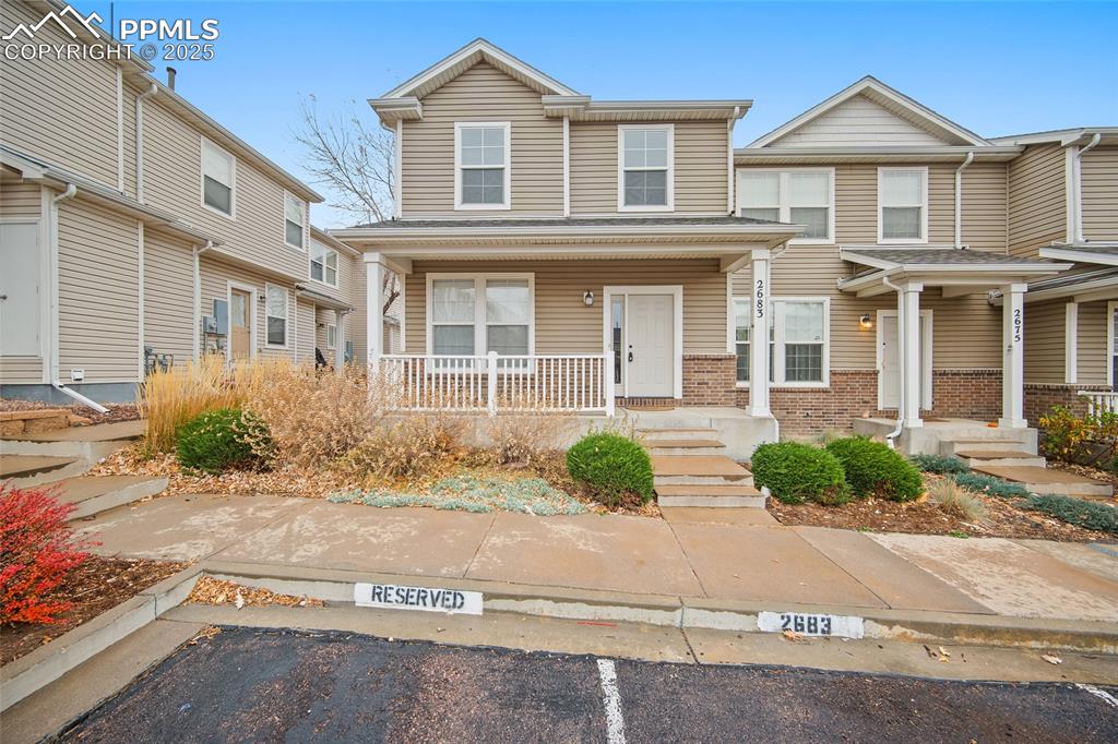 Welcome to this perfectly sized two-story end-unit townhome in the centrally located Spring Creek Traditional community! Enjoy a welcoming covered front porch, perfect for relaxing outdoors. Inside, the home offers a bright, spacious living room and an inviting eat-in kitchen—great for everyday living and easy entertaining. The main level also includes a convenient laundry area with washer and dryer included. Upstairs, you’ll find three well-proportioned bedrooms, including a primary suite with its own private bath. Step out back to enjoy a grassy yard area, offering a comfortable outdoor space rarely found in townhome living. Additional highlights include central A/C, an assigned parking space, and low-maintenance exterior upkeep provided by the HOA. With quick access to Downtown, Fort Carson, Peterson SFB, shopping, restaurants, parks, and major roadways, this location makes commuting and daily errands a breeze. A great opportunity for first-time buyers, downsizers, or investors seeking low maintenance living in a convenient Colorado Springs location.