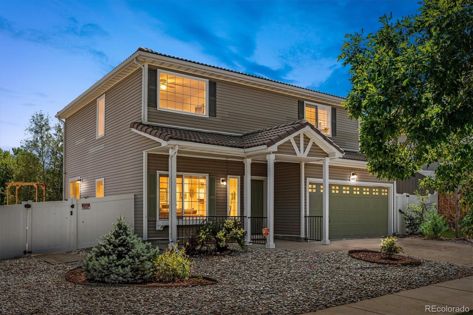 Set on a generous corner lot in Green Valley Ranch, this inviting home offers a wonderful blend of comfortable living, & thoughtful functionality. Inside, a welcoming foyer introduces a well-designed floor plan with 3 bedrooms, 2.5 baths & an upstairs loft that adapts beautifully to the way you live. The main level centers around an inviting great room, where gorgeous tile flooring extends throughout, creating a sense of continuity. A striking 3-sided fireplace serves as the architectural focal point, thoughtfully connecting the great room to the elevated dining & kitchen. The kitchen is equally well suited with abundant cabinetry, a prep island, clever roll-out storage and an oven/microwave combo featuring convenient air-frying technology. A main-floor laundry room & powder bath add an appreciated layer of convenience. Upstairs, the loft provides valuable additional living space; whether envisioned as a home office, or play space, it offers the flexibility to evolve. 2 generously sized secondary bedrooms share a full bath, while the primary suite offers a peaceful retreat, complete with an expansive W/I closet & en suite bath w/extra-deep soaking tub. Beyond the living spaces, the generous patio provides an inviting place for quiet time or fun, while the ample yard leaves plenty of room for gardening or play. Combined w/the expansive corner-lot setting & low-maintenance xeriscaped front yard, the outdoor spaces offer both beauty and practicality. A thoughtful collection of features adds to the home’s comfort and efficiency; a smart thermostat & smart sprinkler system, security system, custom shutters & shades, & ceiling fans throughout. The fully owned solar system is already producing energy & generating a credit back. A durable tile roof adds another layer of long-term value. Comfortable without feeling ordinary, thoughtfully designed without feeling overdone, this home offers the space, flexibility and everyday livability to make it truly feel like home.