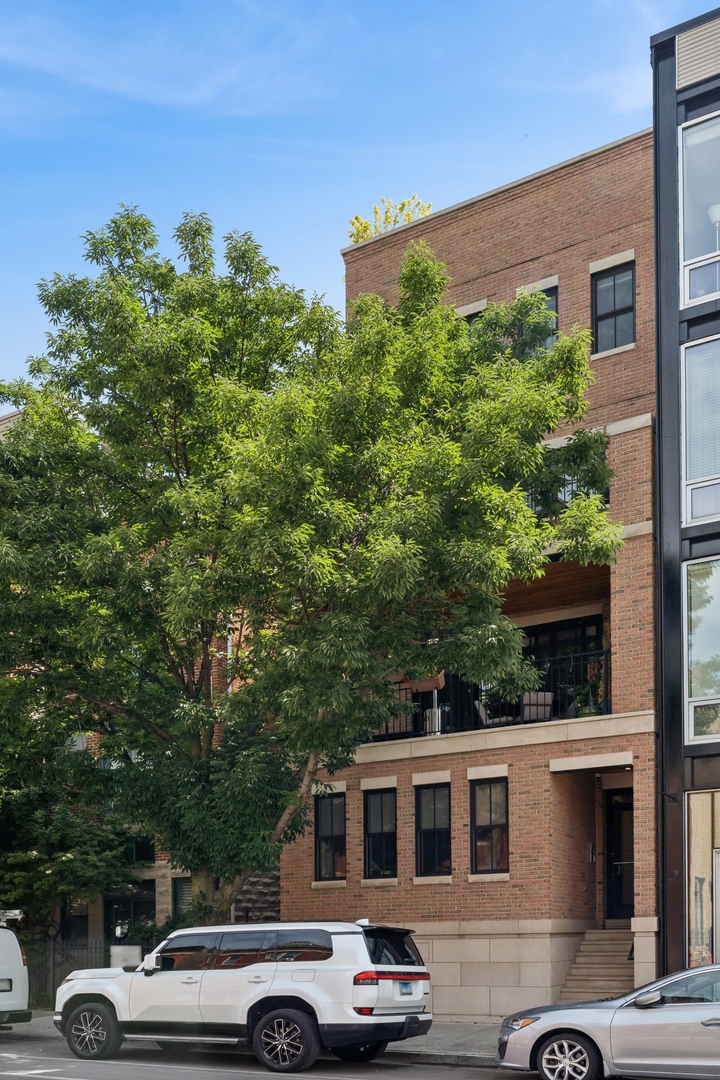 Modern Penthouse Duplex with Rooftop Oasis in Prime Bucktown    Exceptional 4-bed, 3.5-bath penthouse duplex in the sought-after Pulaski School District. Over 3,400 sq ft of elegant living space-a perfect single-family alternative. Features include concrete soundproofing, integrated smart home technology, and hardwood floors throughout. The main level offers spacious living/dining areas opening to a large private terrace.    Highlight: fully equipped rooftop deck with skyline views, outdoor kitchen, gas firepit, pergola with TV/speakers, and irrigated landscaping. Chef's kitchen boasts white cabinetry, Sub-Zero/Wolf appliances, and premium stone counters. Upstairs features four spacious bedrooms, including a luxurious primary suite with dual walk-in closets and a spa bath with steam shower, soaking tub, body sprays, and heated floors.    Additional features: dedicated office/library, custom closets, motorized shades, and integrated HVAC/security/audio controls. Garage parking included. Steps from parks, dining, shopping, and transit in vibrant Bucktown.