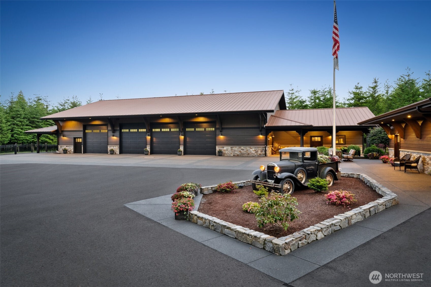 Incredible opportunity to build generational wealth on 40+ acres of timberland with +/- $1M in marketable timber. This serene estate features a 2 bed, 2.5 bath 5,300+ sq ft shop house with 4-bed septic, granite countertops, and showcase car shop. Enjoy a gated entrance, paved drive, and total ~12,000 sq ft of finished space including multiple shops, barn with loft, greenhouse, woodshed, and trails. Solar, ductless heat, and ADU potential offer modern comfort. Ideal for entertaining or creating a retreat surrounded by nature and abundant wildlife.