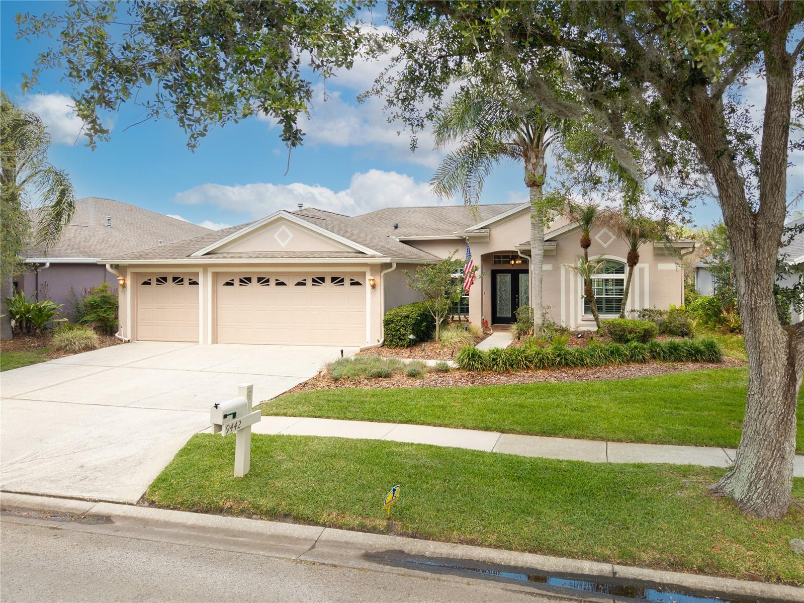 Pond views, private pool, and a backyard filled with birds and everyday wildlife set the tone for this original-owner home in Hunter’s Green offering 4 bedrooms, 3 baths, and approximately 2,255 sq ft on a pond lot chosen for its open water view. The screened pool and covered lanai overlook the pond, creating a comfortable daily routine—morning coffee by the water and evening swims with peaceful, unobstructed views. Inside, the layout includes multiple living and dining areas with a split-bedroom floor plan that gives separation between the primary suite and secondary bedrooms. The kitchen features a gas range and opens to the main living space and out to the pool, making it easy to stay connected whether you’re hosting or just enjoying a typical day at home. Over the years, the home has been well cared for and has hosted many gatherings, with the indoor-outdoor setup naturally supporting celebrations and get-togethers. The primary suite features pond views and direct access to the lanai, while the additional bedrooms offer flexibility for guests, workspace, or hobbies. Natural light fills the main living areas, with clear sightlines to the pool and water beyond. The backyard offers pond frontage with no direct rear neighbors, combining open views with a sense of space and privacy. Home also features a water filtration system, AC 2025, Outdoor lighting, Roof replaced 2016.Located within the gated Hunter’s Green community in New Tampa with access to golf, tennis courts, park space, and walking paths. Conveniently positioned about 2.5 miles to Flatwoods Park, 6.5 miles to The Shops at Wiregrass, 6.2 miles to AdventHealth Wesley Chapel, and roughly 4.5 miles to I-75 for access to downtown Tampa, Tampa International Airport, and surrounding areas. Includes private pool, lanai, and water-facing outdoor space. Come take a look and see how the pond views and pool setting come together in person.
