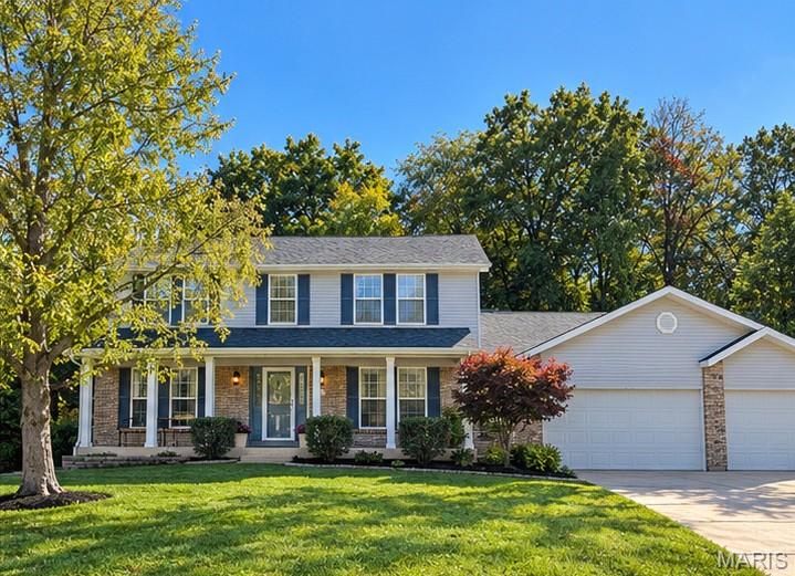 Welcome to a home where everyday living feels a little more special! Tucked away on a quiet cul-de-sac in St. Peters, this inviting 2 story offers the perfect blend of space, comfort, and a peaceful wooded setting. Imagine starting your morning on the large covered front porch, gathering with friends around the fireplace, or unwinding on the deck overlooking the backyard and tranquil woods beyond. Inside, an open floor plan creates an easy flow for both everyday living and entertaining. The entry foyer welcomes you into a dining room ready for holiday gatherings and a dedicated office or study ideal for working from home. The spacious eat-in kitchen features new luxury vinyl tile, a center island, pantry, and plenty of room to gather, flowing seamlessly into the living room, where a bay window brings in natural light and a woodburning fireplace framed by built-in bookshelves creates a warm, inviting focal point. Main-floor laundry adds everyday convenience. Upstairs, retreat to the spacious primary suite featuring a walk-in closet, double vanity, separate shower, and relaxing soaking tub. Three additional bedrooms and a full hall bath provide plenty of room for family, guests, or hobbies. Newer upstairs carpet, installed in 2025, adds a fresh touch. The partially finished lower level extends your living space with a recreation room, bar area, sleeping room, and full bath, while a separate unfinished area offers valuable storage. An attached 3 car garage provides even more space for vehicles, gear, and weekend projects. Beyond home, enjoy a location that puts you close to it all. Explore the shops and restaurants of downtown Cottleville, enjoy convenient access to St. Charles Community College, or head to the Mid Rivers corridor for even more shopping and dining. With easy access to I-64, I-70, and Hwy 364, commuting and getting around are a breeze. Enjoy the space to spread out, the setting to slow down, and the convenience to make the most of every day.  Don't miss this one!