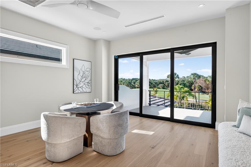 Dining space featuring light wood finished floors and ceiling fan