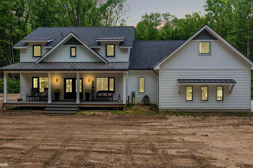 BRING ALL OFFERS, MOTIVATED SELLER **Stunning Newly Custom Built Modern Farm House designed on 11+ peaceful wooded country acres in the city... with *City Water/*City Sewer & on a *Paved Road! This one of a kind home features a 2,675+sqft floor plan equipped with 3 Bedrooms,Den or 4th bedroom, 2 full baths & 1 half bath including a True Primary Bedroom Suite on the main floor with a stunning full tiled bath & Incredible custom walk in closets. Upon entry you will notice the attention to detail and functionality this home possesses. Large Great room/dinning/kitchen areas flow openly together all offering wonderful views.This  Gorgeous Custom Kitchen features granite tops,tiled backsplash,built in appliances, Coffee station area & large walk in pantry!Outside you will find a large covered Porch great for entertaining family&friends while watching the wild life right in your backyard! Plus enjoy the loft media room with Stunning Balcony! An additional HUGE unfinished bonus area,owners call their basement & the attached 2.5+ car garage offers lots & lots of storage space!
