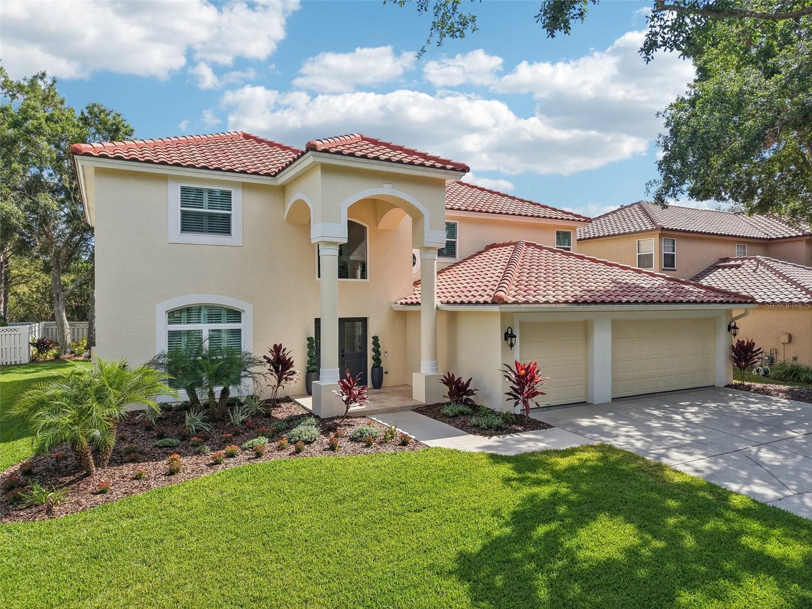 EXQUISITELY RENOVATED 6-BEDROOM POOL HOME IN HUNTER’S GREEN!

Prepare to be captivated by this stunning 6-bedroom, 3-bathroom pool home in the coveted New Tampa community of Hunter's Green, which has undergone a COMPLETE INTERIOR RENOVATION offering an essentially new home experience! Peace of mind abounds with MAJOR RECENT UPRADES including a NEW TILE ROOF (2022), 2 NEW HVAC UNITS (2022), and All NEW WINDOWS throughout.
Step inside and be greeted by a DRAMATIC 2-STORY HIGH FOYER area, setting a grand stage for the rest of the home. Notice the attractive new stairway railing and modern spindles as LUXURIOUS LVP FLOORING flows seamlessly everywhere – NO CARPET! Architectural elegance continues with graceful arched windows adorned with PLANTATION SHUTTERS, HIGH-END WINDOW TREATMENTS, decorative niches, and stately columns. The living area features CUSTOM BUILT-IN BOOKCASES and a COZY ELECTRIC FIREPLACE, creating a sophisticated focal point.
The heart of this home is the breathtaking, FULLY RENOVATED KITCHEN, boasting gleaming QUARTZ COUNTERTOPS, a gorgeous UPGRADED BACKSPLASH, TOP-OF-THE-LINE STAINLESS STEEL APPLIANCES including a GAS RANGE, and beautiful white cabinetry. A versatile DOWNSTAIRS BEDROOM AND FULL BATHROOM offer ideal solutions for guests or multi-generational living.
Upstairs, the serene primary suite awaits, featuring an elegant TRAY CEILING and a spa-inspired en suite bathroom complete with a LUXURIOUS SOAKING TUB and a large walk-in shower. Five additional spacious bedrooms provide ample accommodation for family and guests.
Step outside to your private oasis – a BEAUTIFUL SCREENED-IN POOL perfect for Florida living. The property also includes a spacious 3-CAR GARAGE. This meticulously renovated home, located in the renowned Hunter's Green community with its manned gates, golf course, parks, and trails, offers unparalleled luxury and modern convenience. Its PRIME NEW TAMPA LOCATION also offers convenient access to major highways, top-tier hospitals, and A-rated schools.
Don't miss this rare opportunity to own a virtually new home in one of New Tampa's premier neighborhoods!