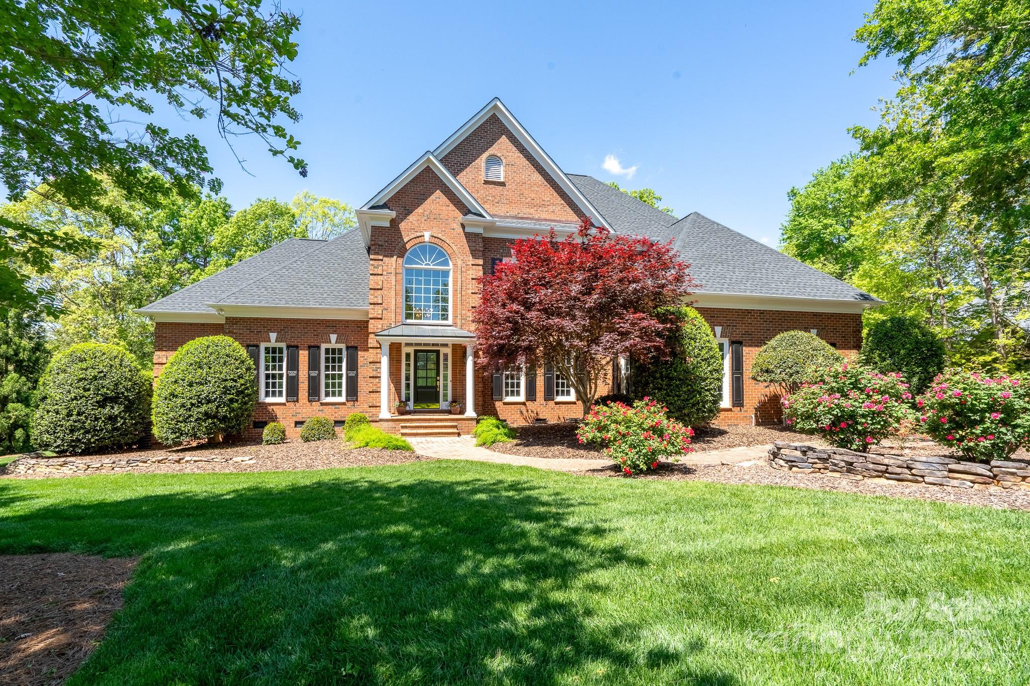 Welcome to your dream home, a meticulously updated 5 bedroom 5 1/2 bath home on the 15th green of Old North State Club's newly renovated Tom Fazio golf course. It offers a professionally landscaped yard & custom fire pit ideal to enjoy golf views & breathtaking sunsets! Step inside to soaring ceilings, newly installed hardwood floors, & a light-filled open floor plan. The updated kitchen is a chef's dream with quartz counters & new Wolf appliances flowing seamlessly into a spectacular breakfast area & keeping room ideal for entertaining. Each bedroom includes an en-suite bathroom. The first floor primary suite is a private retreat, with a spa inspired bath & 2 walk in closets. Additional features include a new roof, heat pump & sealed crawl space. This move-in ready home is just an hour from Charlotte & the Triad, & a bit further from Raleigh. With membership enjoy the Old North State Club’s golf, tennis, pickleball, pool, dining, fitness & more.