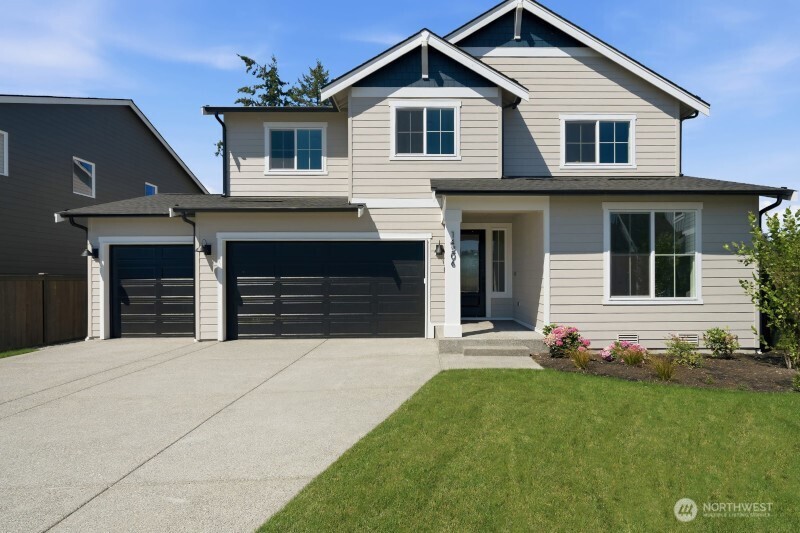 Come visit this gorgeous home with nearly 3000 Sq Ft of living space on an impressive large homesite. Gourmet kitchen boasts quartz countertops, full-height tile backsplash, 36” soft-close shaker cabinets, premium Whirlpool appliances including 30” gas range. Primary suite offers oversized bedroom, spacious walk-in closet, stand-alone tub, tiled shower & quartz counters. Leisure Loft, 3 additional bedrooms, full bath & laundry room finish out the upstairs. Energy-efficient features include W/D, heat pump (A/C), hybrid water heater & EV charger pre-wire. Open-concept layout, 9’ ceilings, wrought iron rails, LVP/laminate flooring, modern electric linear fireplace & designer selected lighting. Enjoy your 3-car garage, professionally landscaped front yard & spacious covered outdoor living. No home behind! Close to JBLM & Canyon Rd for commuting. Community will have a future clubhouse. Interior pics are not of actual home/floorplan and may contain upgrades. Ask about our Buyer Bonus! Colors and specs may vary.