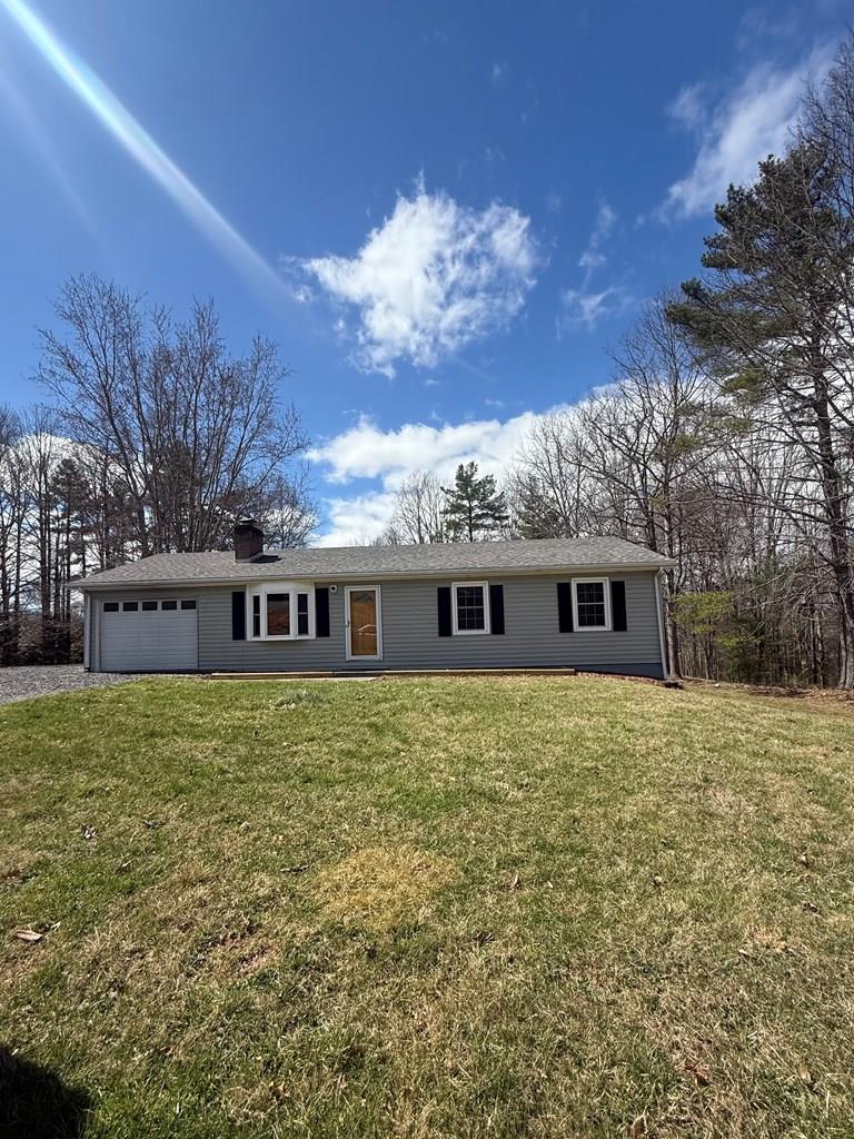 Discover 155 Lonesome Dove Drive, Woodlawn, VA 24381 in a desirable yet quiet neighborhood on a dead end road.This 3 bedroom, 1.5 bath, 1,548 sq ft home features all new paint and LTV flooring throughout giving it a modern feel. You will find plenty of storage with an attic over the garage, unfinished basement, hall closets, and an outdoor building. This home is convenient to Galax as well as I-77 providing comfortable living in a peaceful setting.
