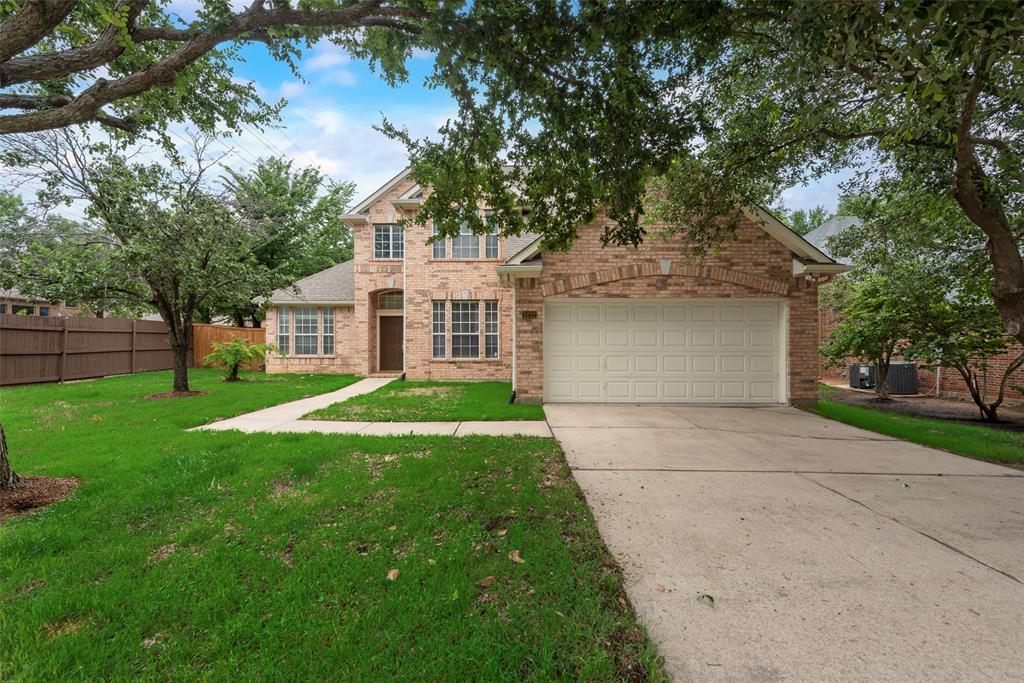 WELCOME TO FLOWER MOUND! This stunning home located in the desirable Flower Mound ISD and highly sought after neighborhood of Lake Forest subdivision. Ideal for families seeking comfort and convenience in Flower Mound, this 4-bedroom, 2.5-bath home sits on a spacious corner lot that backs to a peaceful greenbelt. The primary suite is located downstairs for added privacy, featuring his and her vanities, a separate shower, a garden tub and huge walk-in closet. While three additional spacious bedrooms and a full bath are upstairs—perfect for kids or guests, and a second living or game room for the entire family to enjoy. A flexible front room can serve as a formal dining area or a home office. The inviting living room features a cozy fireplace with gas logs, beautiful wood floors and the light-filled breakfast nook is great for family meals. The kitchen includes ample cabinetry and counter space, a central island, granite counters and tile flooring. Enjoy the serene backyard with no rear neighbors and access to nearby trails. Located near top-rated schools, parks, shopping, and dining—this is the family home you've been waiting for in Flower Mound. Fresh paint throughout the entire interior of home, new carpet in office and primary suite, which also includes a new shower. Don't miss this opportunity!