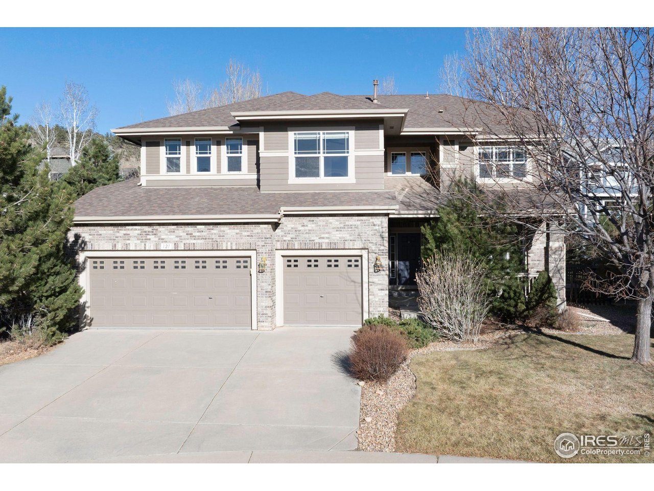 Set on a quiet cul-de-sac in the highly desirable Stone Canyon community, this exceptional home offers a rare blend of natural beauty, and refined living, just steps from open space and scenic trails. Inside, a grand two-story entry with a sweeping curved staircase creates an impressive first impression. Formal living and dining rooms showcase a charming bay window and are seamlessly connected to the kitchen by a convenient butler's pantry. Designed with both style and function in mind, the gourmet kitchen boasts a large center island with breakfast bar, granite countertops, abundant cabinetry, stainless steel appliances, double ovens, a gas cooktop, and a built-in desk area. The adjoining breakfast nook opens to the beautifully landscaped 0.22-acre lot and expansive deck, perfect for effortless indoor-outdoor living. The welcoming family room is anchored by a cozy gas fireplace and offers direct access to the backyard. A private main-level office, a well-equipped laundry room with sink and storage, and a chic powder room complete the main floor. Upstairs, a spacious loft with custom built-ins provides flexible living space. The tranquil primary suite feels like a secluded retreat among the trees, featuring walls of windows, a three-sided fireplace, a spa-inspired five-piece bath, and a generous walk-in closet with built-in dresser. Two secondary bedrooms share a Jack-and-Jill bath, while a fourth bedroom enjoys its own private ensuite. The unfinished basement offers high ceilings, egress windows, and rough-in plumbing, an ideal blank canvas for future expansion. Additional highlights include oversized windows that frame the surrounding natural beauty and a spacious 3-car garage for all your Colorado lifestyle gear. With easy access to downtown Lyons, parks, trails, and schools, this home delivers comfort, elegance, and everyday convenience in an exceptional setting.